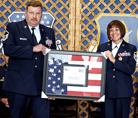 WRIGHT-PATTERSON AIR FORCE BASE, Ohio - Family members, friends and colleagues commemorated the retirement of Master Sgt. Robert Anderson, 445th Maintenance Operations Flight, and Master Sgt. Mary Anderson, 445th Maintenance Squadron Sept. 10 in a dual-retirement ceremony here. (U.S. Air Force photo/Senior Airman Mikhail Berlin)
