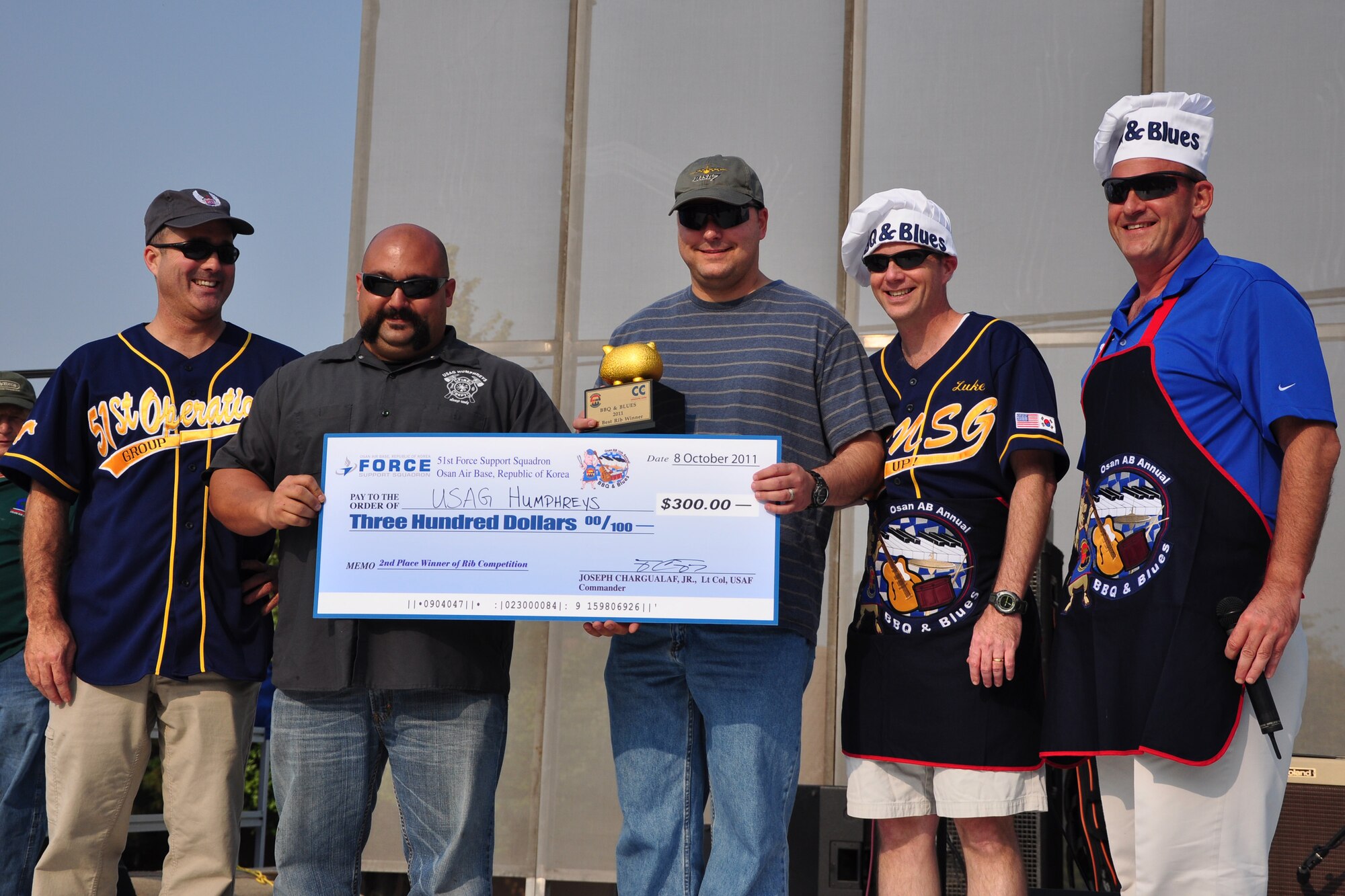 Camp Humphreys Fire Department was award second place in the best rib competition Oct. 8, 2011, during the 10th Annual “BBQ & Blues” event hosted by the 51st Force Support Squadron at the parking lot near the Officers Club. This day of free food and fun was filled with barbecued ribs and the sounds of music pounding away at the eardrums. Eighteen groups started their day at about 7 a.m. to compete to be crowned the team with the best ribs on base. (U.S. Air Force photo/Tech. Sgt. Chad Thompson)