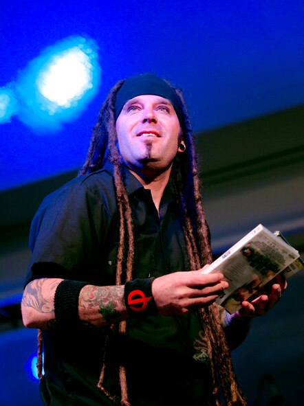 American rock band Saliva performs a concert in the football field at Kunsan Air Base, Republic of Korea, Oct. 5, 2011. Saliva stopped by the Wolf Pack during their Pacific Armed Forces Entertainment tour. After the show, the rock band took time to sign autographs and take pictures with Wolf Pack members. (U.S. Air Force photo by Staff Sgt. Kyle Higdon/Released)