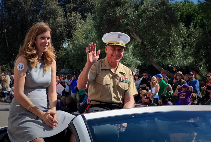 Maj. Gen. Melvin G. Spiese, commander of 1st Marine Expeditionary Brigade, accompanied by his wife Filomena, acts as a military marshal 143rd Annual Italian Heritage Parade, Oct. 9, 2011. Marines and sailors with the expeditionary force traveled to San Francisco aboard the USS Bonhomme Richard to participate in Fleet Week to showcase the Navy and Marine Corps’ amphibious nature, readiness and ability to respond to disasters.