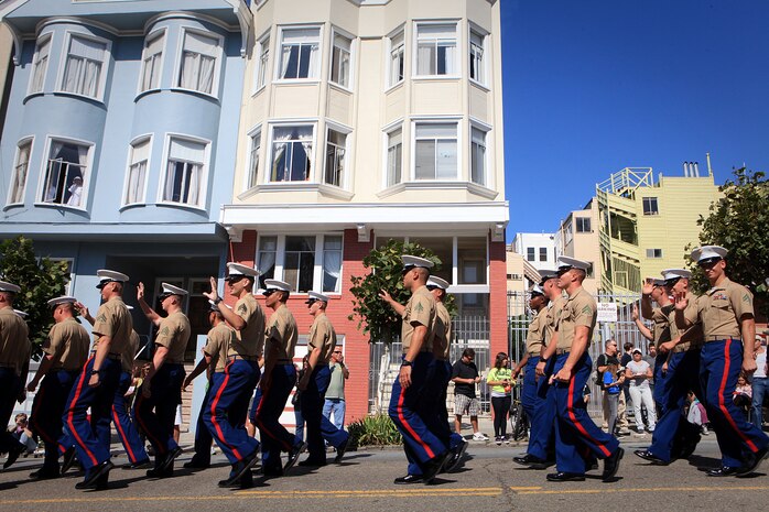 San Franciscans cheer for Marines serving with 1st Marine Expeditionary Brigade marching down Filbert Street during the 143rd Annual Italian Heritage Parade, Oct. 9, 2011. Marines and sailors with the expeditionary brigade traveled to San Francisco aboard the USS Bonhomme Richard to participate in Fleet Week to showcase the Navy and Marine Corps’ amphibious nature, readiness and ability to respond to disasters.