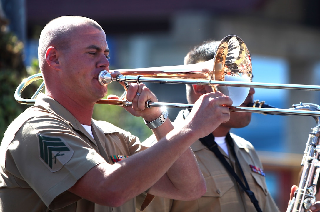 Sgt. Christopher Parham, a trombone player with the 1st Marine Division Party Band, "Old Breed Brass," plays a selection during a free concert at Pier 39 in San Francisco Oct. 8. Hundreds of local community members came out for the show as part of San Francisco Fleet Week.