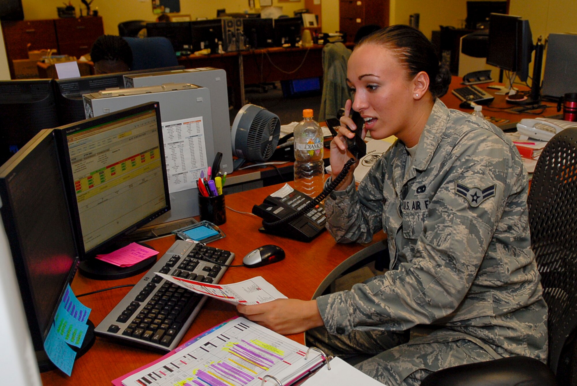 U.S. Air Force Airman 1st Class Quincey Bergeron, 18th Maintenance Operation Squadron fighter scheduler, schedules jobs in the integrated maintenance data system on Kadena Air Base, Japan, Oct. 12, 2011. Bergeron is a member of the maintenance operations flight, which is the central agency for monitoring and developing long-range strategies to sustain the health of the fleet. (U.S. Air Force photo/Airman 1st Class Tara A. Williamson)