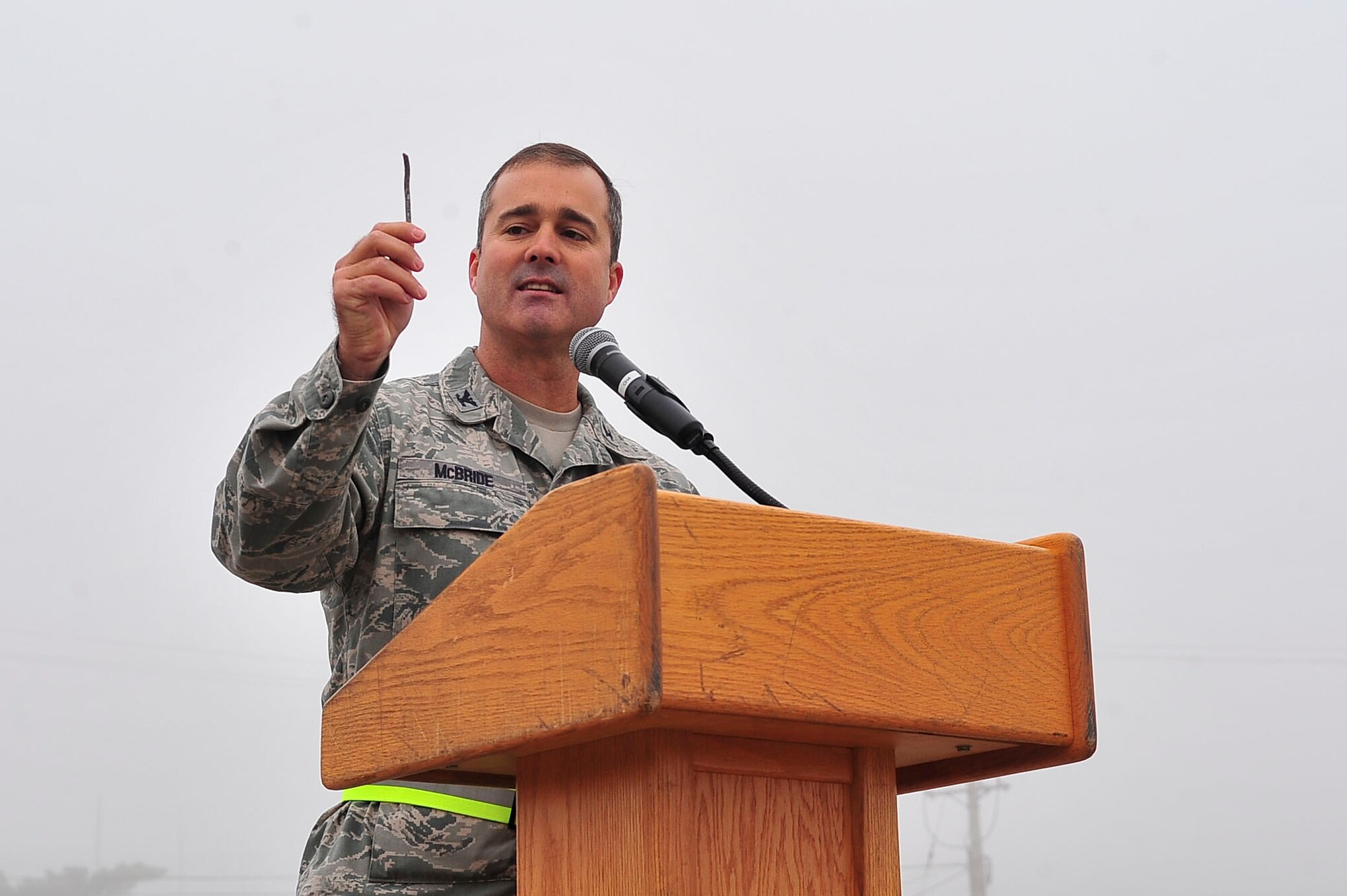 Col. Keith D. McBride, 51st Operations Group commander, holds a piece of Foreign Object Debris found during the FOD walk on Oct. 11, 2011. During the FOD walk approximately 2000 Airmen participated while 5 were awarded for finding the “golden bolt”. The recipients who found the “golden bolts” received a 24-hour pass and a coin from the 51st Fighter Wing vice commander. (U.S. Air Force photo/Senior Airman Adam Grant)     
