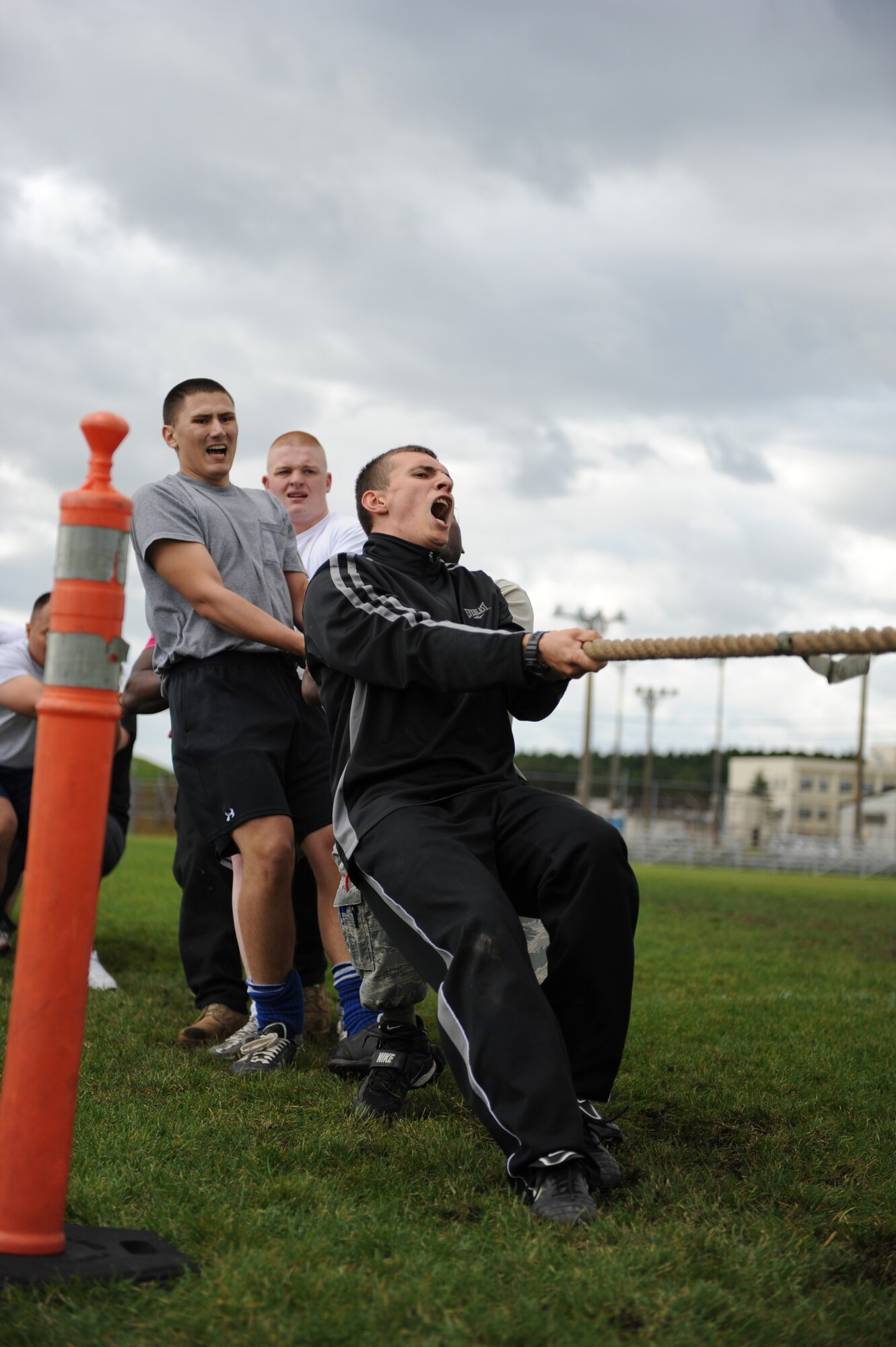 MISAWA AIR BASE, Japan -- Members of the 35th Logistics Readiness Squadron combine their strength to try and overpower their competitors in a game of tug of war during the wing sports day here Oct. 7. The 35th Fighter Wing held a sports day to promote physical fitness, teamwork, competition, sportsmanship and esprit de corps. The day was kicked off with a 3-mile run followed by various sporting events to include relay races, basketball, softball, ultimate frisbee, soccer and a readiness competition. Approximately 14 units from the base formed teams to participate in each event. (U.S. Air Force photo/Airman 1st Class Kia Atkins)