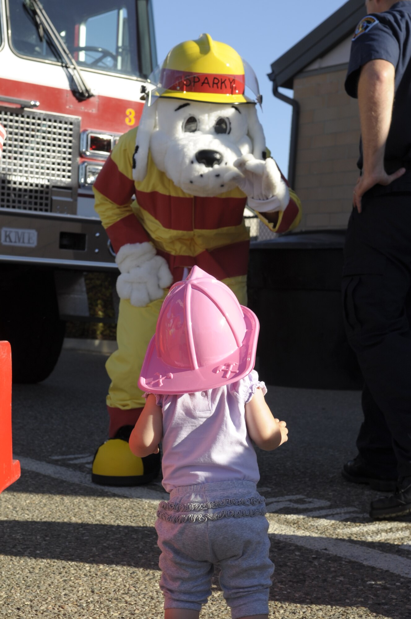 VANDENBERG AIR FORCE BASE, Calif. -- Children from the Vandenberg Child Development Center greet Sparky the Fire Dog here Wednesday, 12 Oct. 2011. Fire Prevention Week runs from Oct. 9-15, and the Vandenberg Fire Department has some great events lined up to promote fire safety awareness. Those events include a parade on Oct. 13 from 5 to 6:30 p.m., a Fire Muster competition Oct. 14 from 10 a.m. to 1 p.m. at the parade grounds here, and cooking fire demonstrations are scheduled for Oct. 15 at 11 a.m. and 1 p.m. at the Vandenberg Exchange.
(U.S. Air Force photo/Jerry E. Clemens, Jr.)