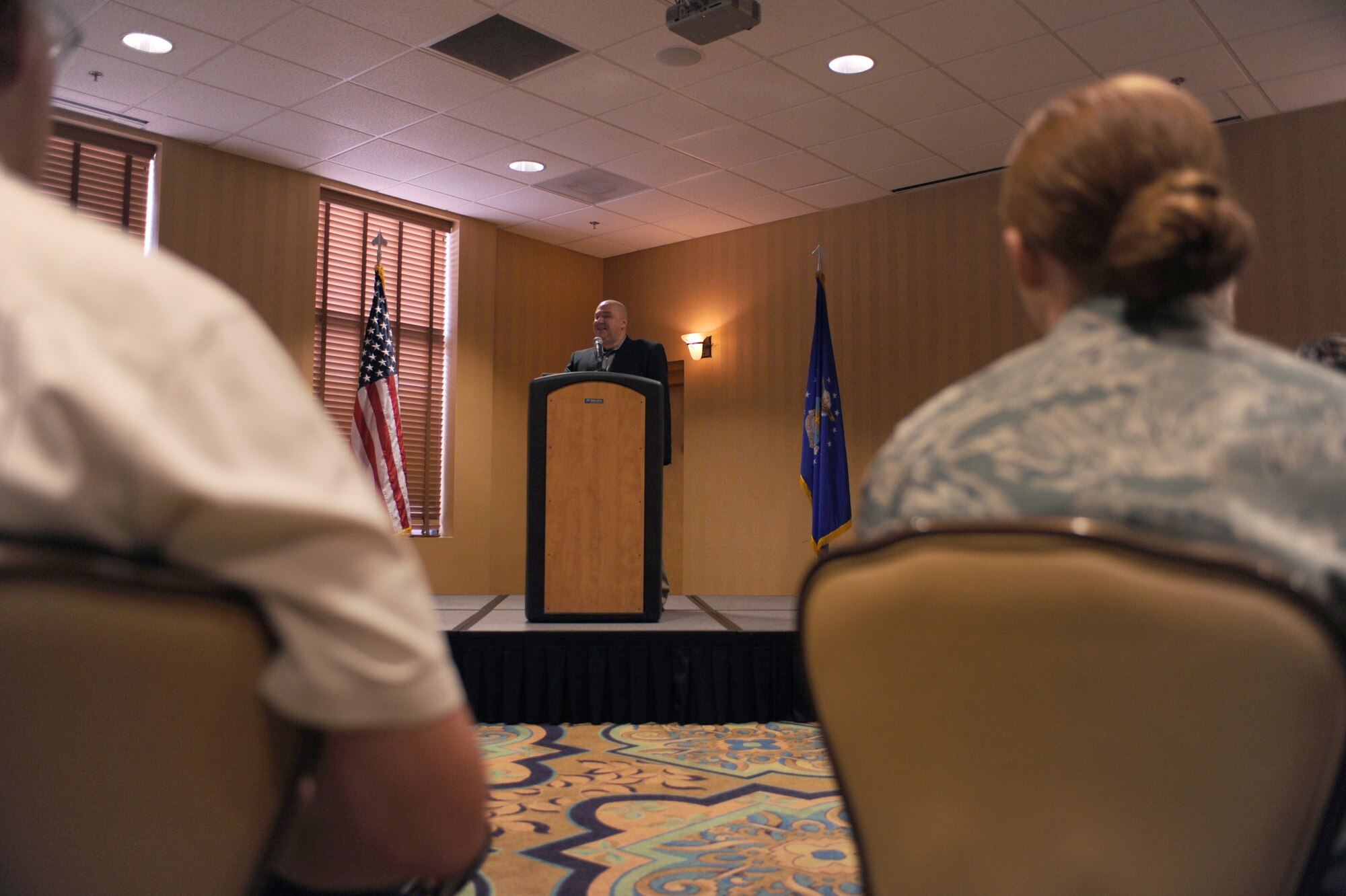 DAVIS-MONTHAN AIR FORCE BASE, Ariz. – Tech. Sgt. Christopher Slaydon, a wounded warrior, speaks of his story at the National Disability Employment Awareness Month Luncheon here Oct. 6. (U.S. Air Force photo/Airman 1st Class Christine Griffiths)