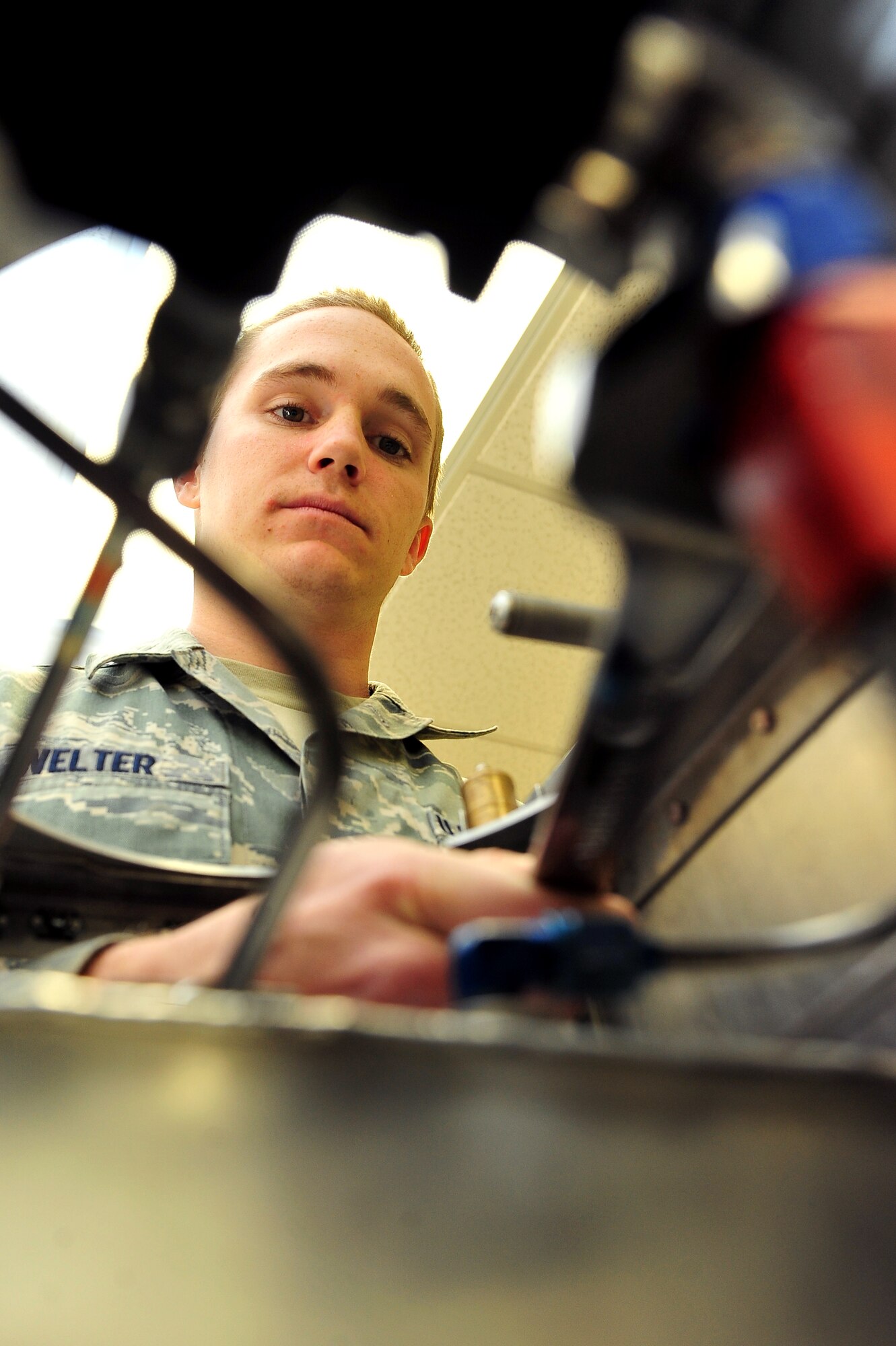 MINOT AIR FORCE BASE, N.D. – Airman 1st Class Timothy Welter, 91st Maintenance Operations Squadron maintenance technician, makes repairs and conducts function tests on a charge cart, which is something he was evaluated on as part of the Air Force Global Strike Command Global Strike Challenge, here Oct 12. The routine maintenance of systems found in the launcher equipment room such as a charge cart is critical to mission effectiveness by providing missile preservation and allowing reliable nuclear and conventional operations. Minot Airmen from both the 5th Bomb Wing and the 91st Missile Wing are participating in this year's AFGSC Global Strike Challenge during the months of June through November to showcase the world's premier bomber and ICBM forces and to recognize outstanding AFGSC personnel and teams. (U.S. Air Force photo/Senior Airman Jesse Lopez)
