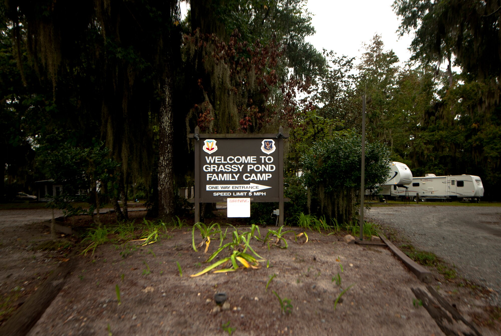 A welcome sign, located near the entrance of grassy pond camp grounds at Grassy Pond, Valdosta, Ga., Oct. 12, 2011. Grassy Pond is a military-only recreational facility that offers visitors accommodations for rent, as well as various equipment for land and water activities. (U.S. Air Force photo by Airman 1st Class Joshua Green/Released)

