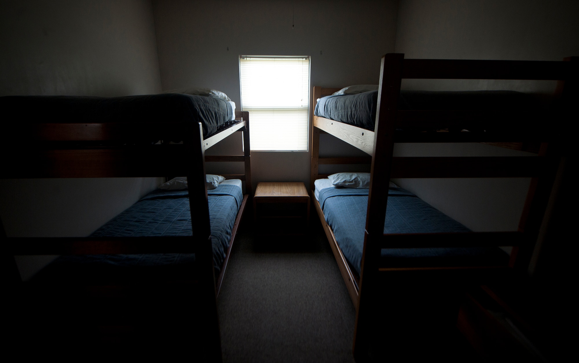 Two bunk beds sit in a cabin room at Grassy Pond in Valdosta, Ga., Oct. 12, 2011. Grassy Pond has four two-bedroom cabins equipped with a stove, refrigerator, master bedroom, television, eating utensils and screened porch. (U.S. Air Force photo by Airman 1st Class Joshua Green/Released)  
