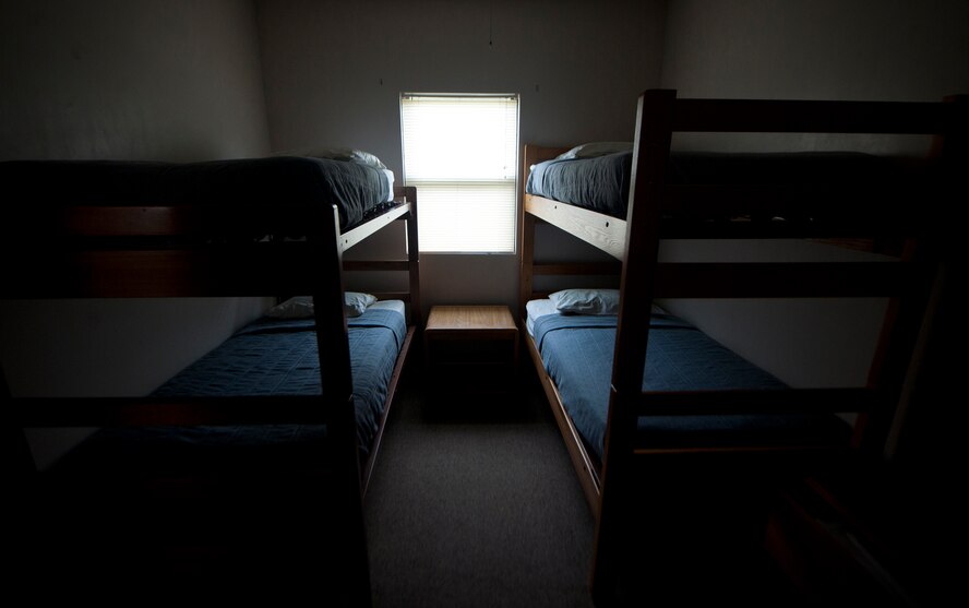Two bunk beds sit in a cabin room at Grassy Pond in Valdosta, Ga., Oct. 12, 2011. Grassy Pond has four two-bedroom cabins equipped with a stove, refrigerator, master bedroom, television, eating utensils and screened porch. (U.S. Air Force photo by Airman 1st Class Joshua Green/Released)  
