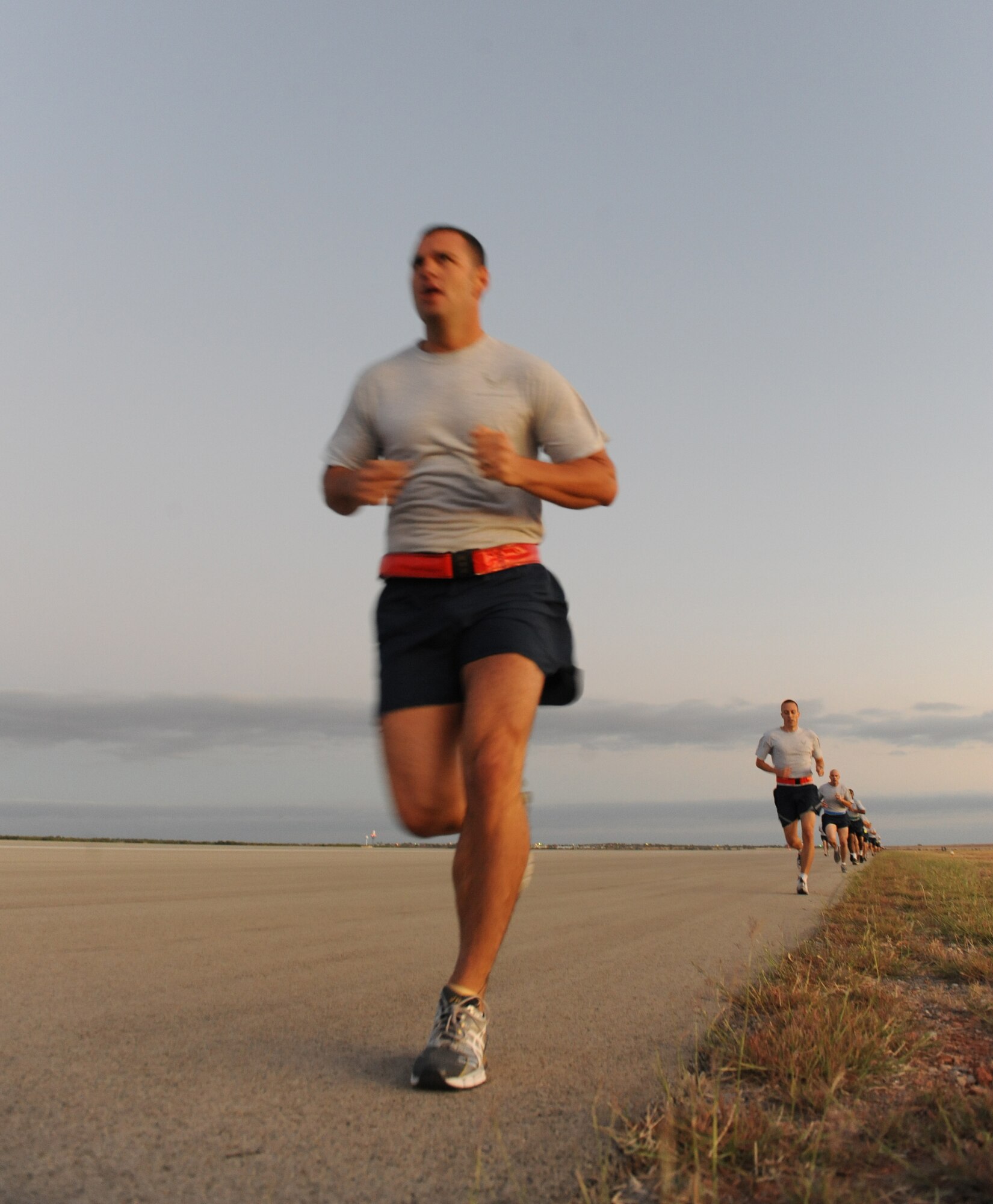 Dyess airmen participate in a 2.5 mile-fun run, Oct. 7, 2011, at Dyess Air Force Base, Texas. The morning fun-run kicked off the many festivities for Wingman Day. (U.S. Air Force photo by Airman 1st Class Peter Thompson/Released)