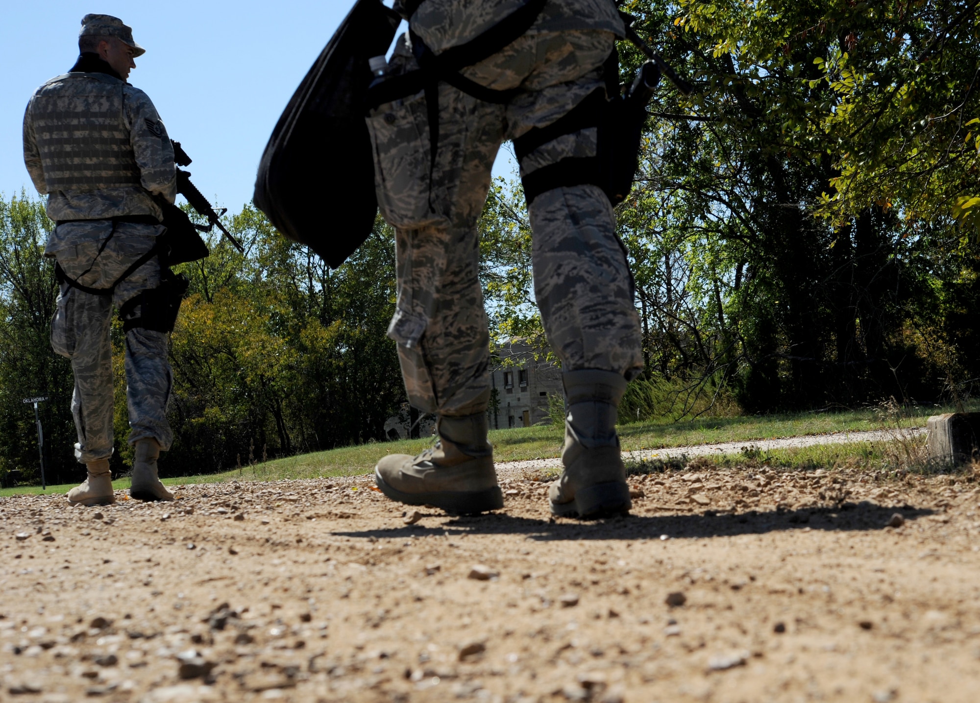 Airmen from the 71st Security Force Squadron at Vance Air Force Base, Okla., perform a foot patrol at Camp Gruber, Okla., Sept. 27. The 71st SFS visited Gruber for two days and used a live-fire range and replica village. (U.S. Air Force photo/ Staff Sgt. James Bolinger)