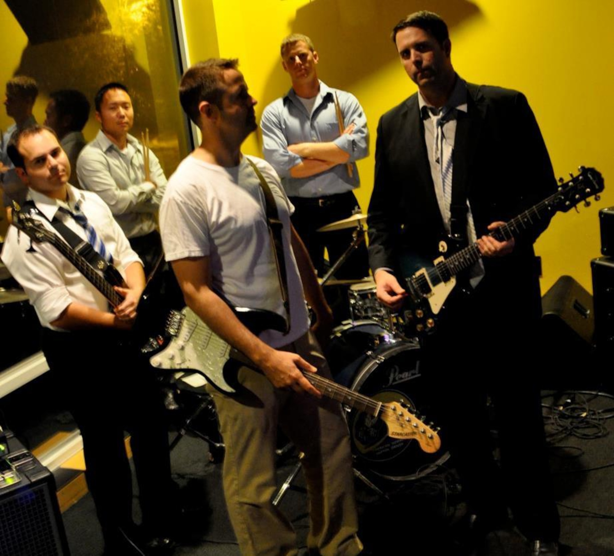 Band members from left to right foreground: Travis Koch and Brad Bird. From left to right background: John Bertieri, Jamie Mun and Ryan Sivertsen. (Courtesy photo) 