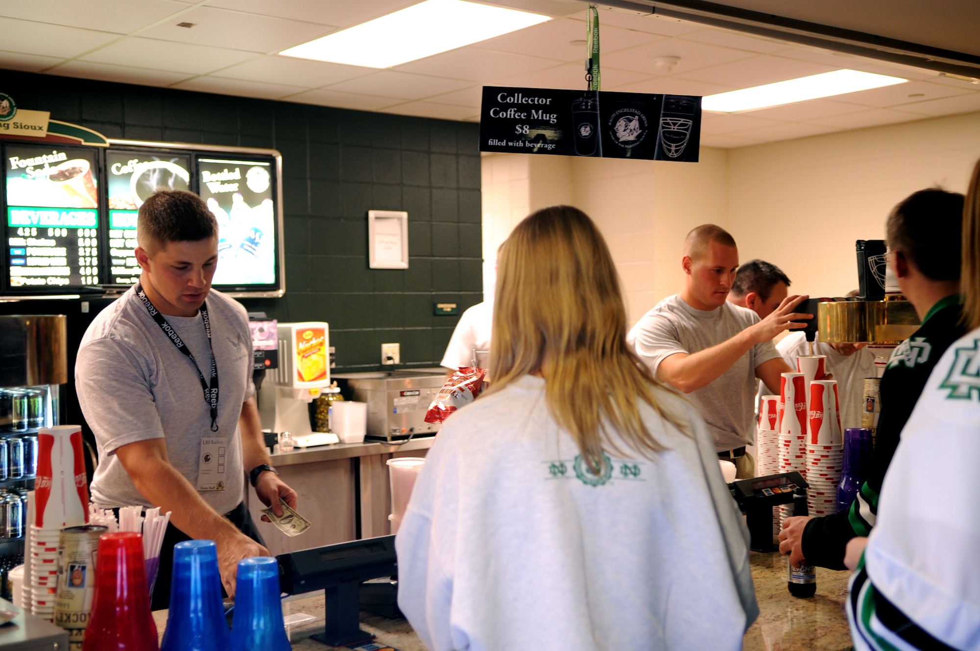 Master Sgt. Jason Gall, 319th Air Base Wing, volunteers at the 15th annual Icebreaker Tournament at Ralph Engelstad Arena in Grand Forks, N.D., Oct 7. The University of North Dakota Fighting Sioux took on the Falcons during the 15th annual Icebreaker Tournament with UND coming out on top 4-3. The season opener marked the 10-year anniversary of the arena.  (U.S. Air Force photo by Senior Airman Amanda N. Stencil)