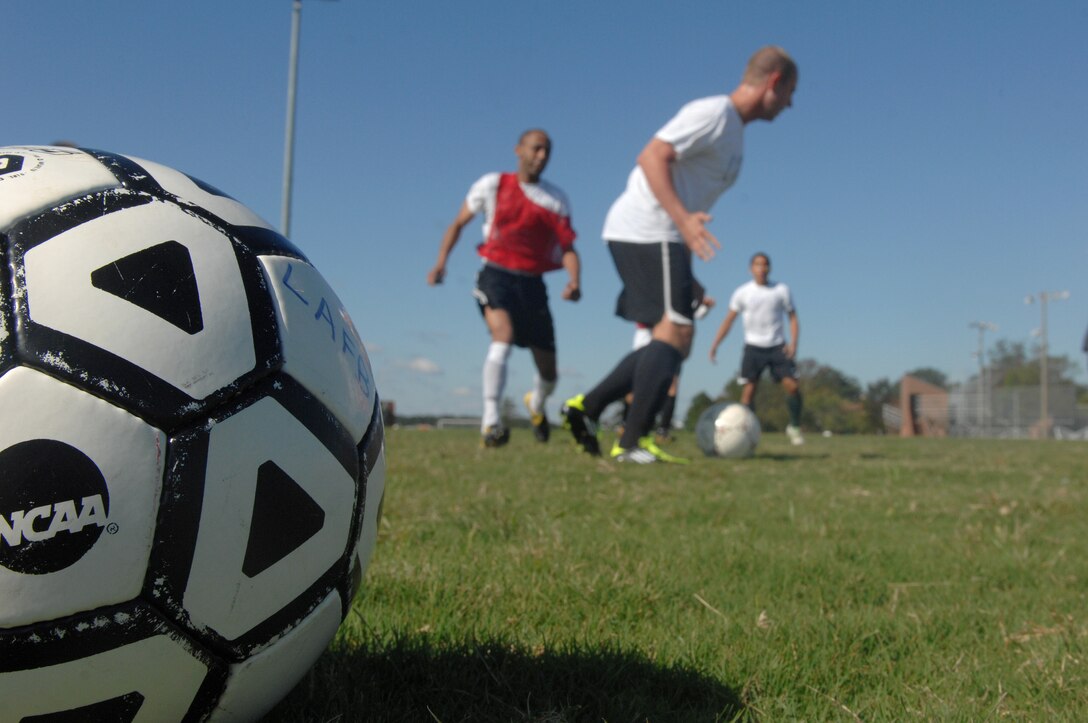 Airman recruits for the 2011-2012 All Air Force Soccer team scrimmage during the All Air Force Soccer Trial and Training Camp held at Langley Air Force Base, Va., Oct. 4, 2011. Air Force sports are available to all Air Force active duty, guard and reserve members. (U.S. Air Force photo by Staff Sgt. Antoinette Gibson/Released)

