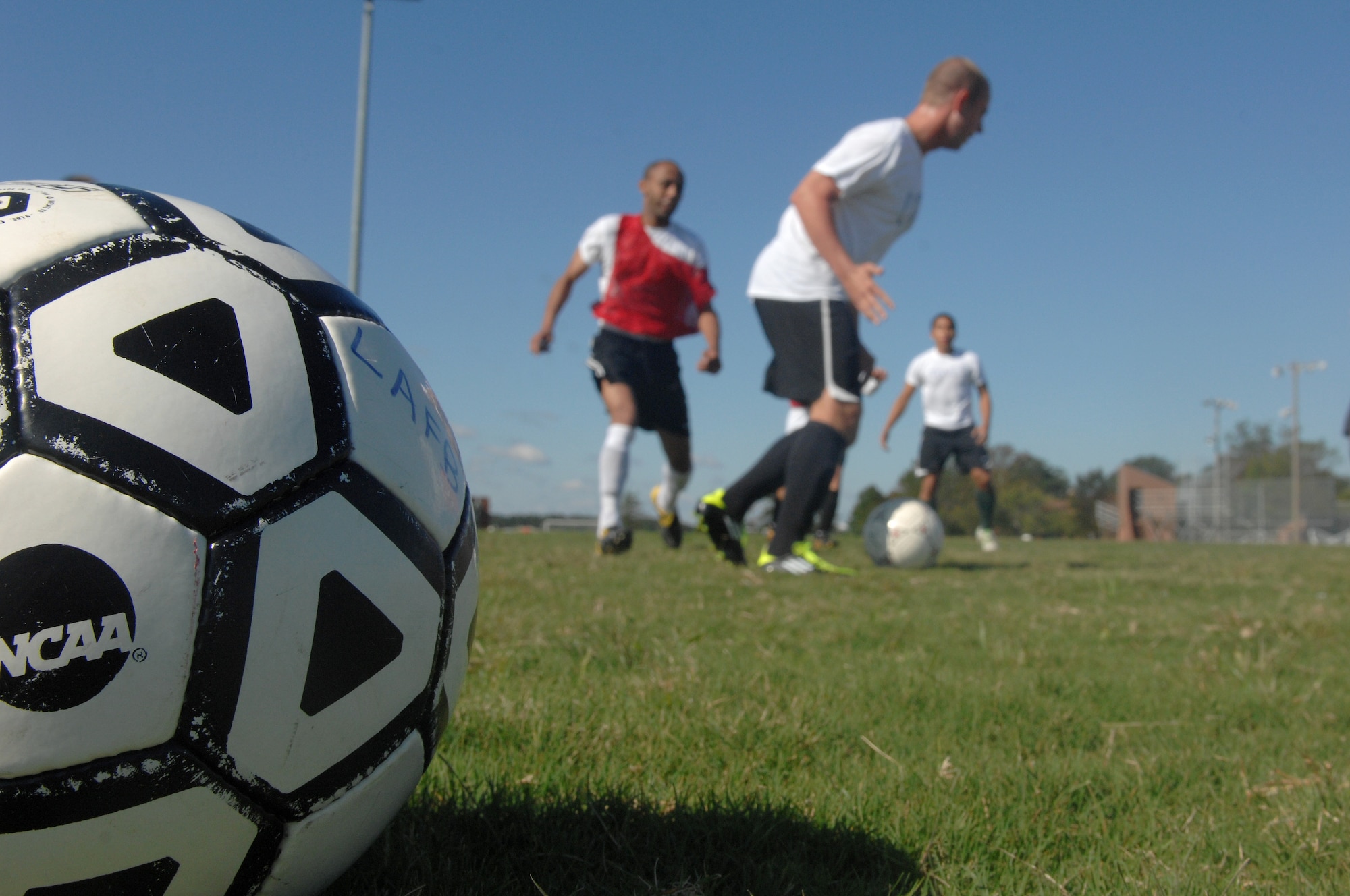 Airman recruits for the 2011-2012 All Air Force Soccer team scrimmage during the All Air Force Soccer Trial and Training Camp held at Langley Air Force Base, Va., Oct. 4, 2011. Air Force sports are available to all Air Force active duty, guard and reserve members. (U.S. Air Force photo by Staff Sgt. Antoinette Gibson/Released)

