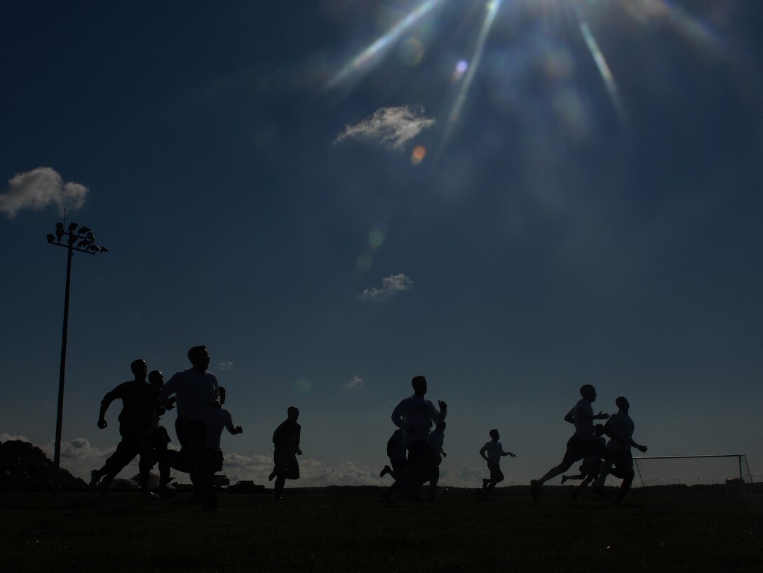 The 2011-2012 All Air Force Men’s Soccer team recruits sprint down the field during the All Air Force Soccer Trial and Training Camp held at Langley Air Force Base, Va., Oct. 4, 2011. Air Force sports are available to all Air Force active duty, guard and reserve members. (U.S. Air Force photo by Staff Sgt. Antoinette Gibson/Released)