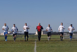 Airman recruits of the 2011-2012 All Air Force Men’s Soccer team warm-up during day one of Trial and Training Camp at Langley Air Force Base, Va., Oct. 4, 2011. Soccer players from all over the world are taking part in three weeks of soccer trials to be evaluated for a spot on the 2011-2012 All Air Force, Men’s Soccer Team. (U.S. Air Force photo by Staff Sgt. Antoinette Gibson/Released)