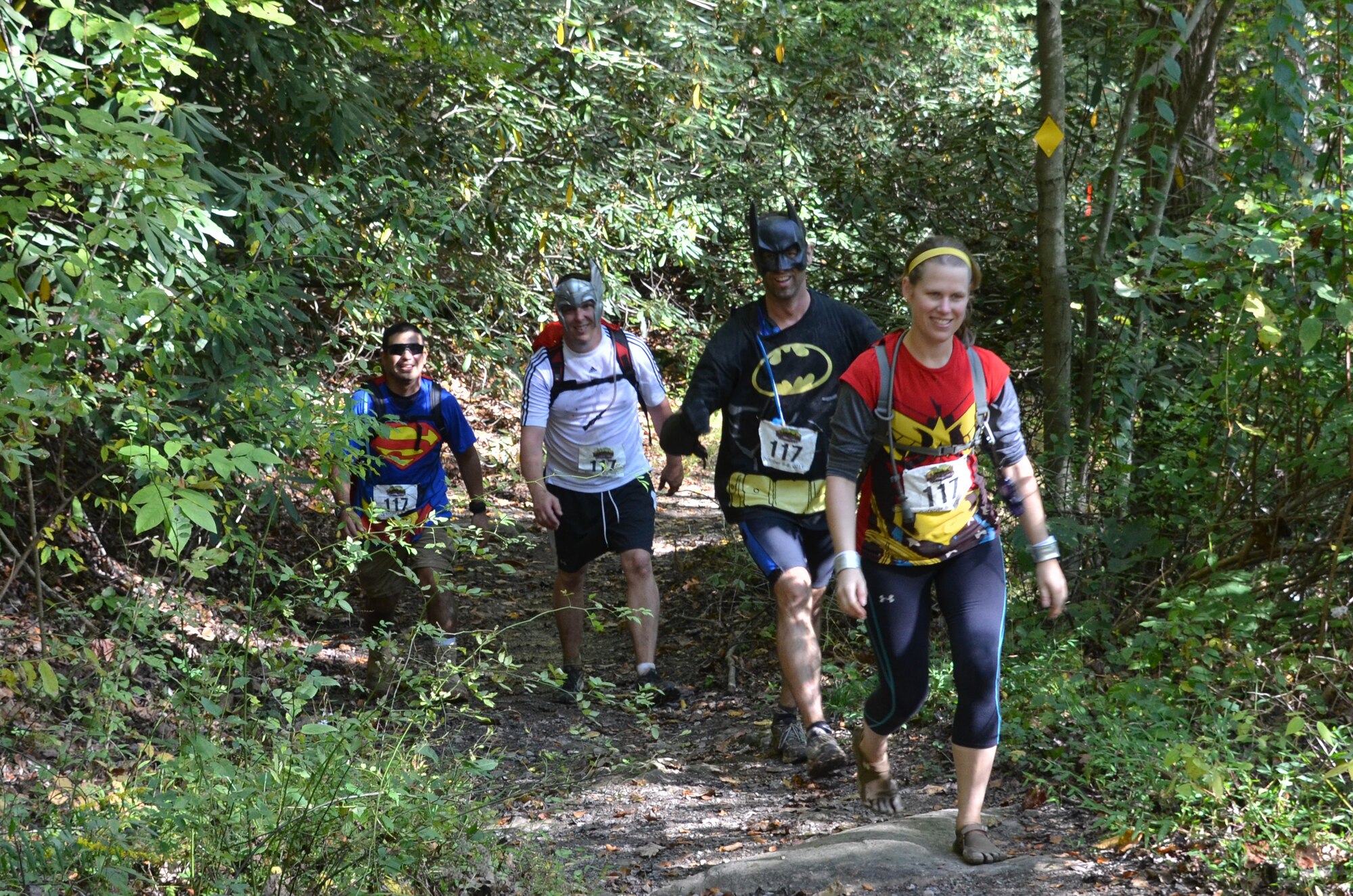 U.S. Army Team America Global Police, hikes out of the woods during the 11th Annual Wilderness Challenge, Oct. 8, 2011, in Fayetteville W.Va. The 15-mile hike was the last event during the fifty-two-mile challenge that consisted of white water rafting, running, biking and hiking.  (U.S. Air Force photo by Tech. Sgt April Wickes/Released)