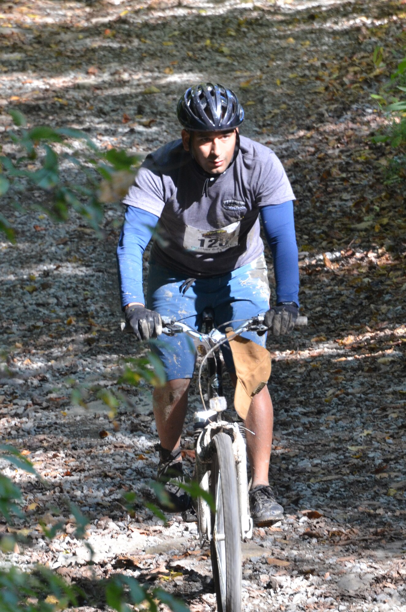 U.S. Marine Corps Gunnery Sgt. Juan Ospina, D Smurfs team captain, heads for the finish line during the mountain- bike portion of the 11th Annual Wilderness Challenge, Oct. 8, 2011, in Fayetteville W.Va. The 12 miles of mountain biking was just one event during the two day challenge that covered fifty two miles of wilderness. (U.S. Air Force photo by Tech. Sgt April Wickes/Released)