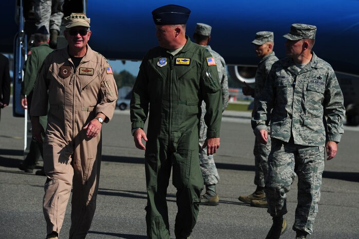 General Duncan McNabb is greeted by Col. Erik Hansen and Col. Richard McComb on the Joint Base Charleston - Air Base flight line Oct. 6. While visiting JB Charleston, McNabb met with local civic leaders and went on a C-17 familiarization flight. McNabb is the U.S. Transportation Command commander, Hansen is the 437th Airlift Wing commander and McComb is the JB Charleston commander. (U.S. Air Force photo/Staff Sgt. Nicole Mickle)