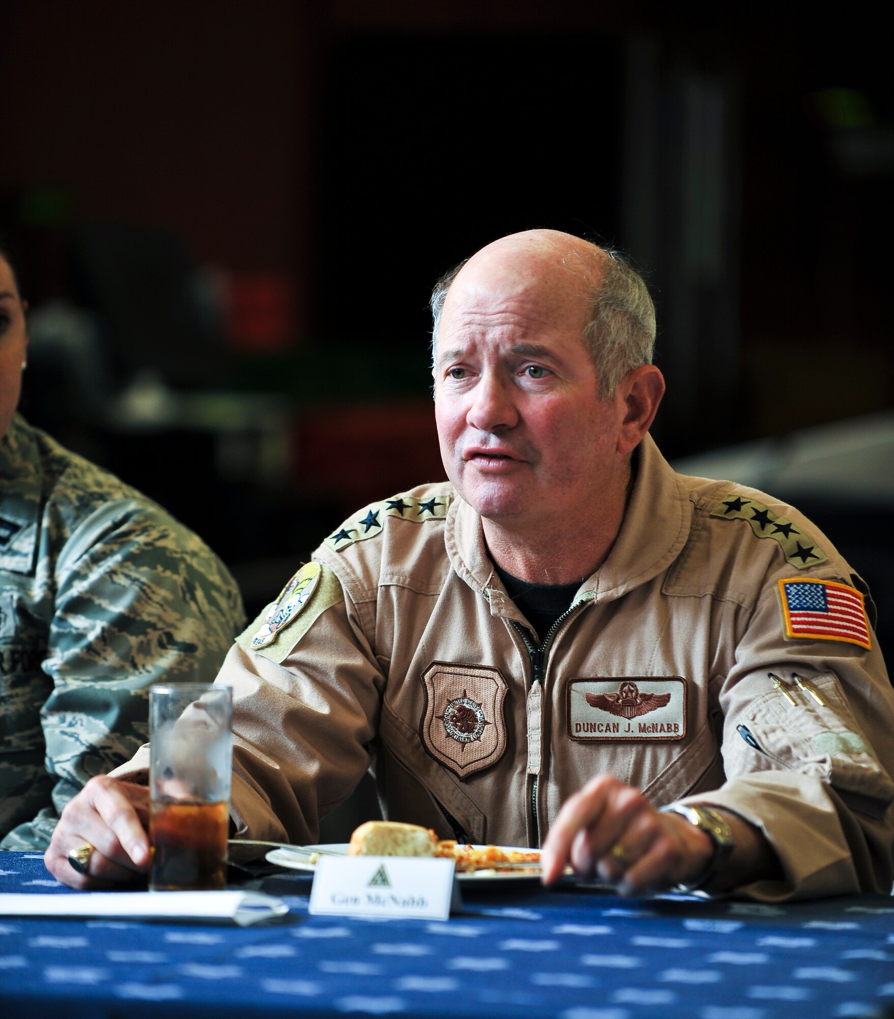 Gen. Duncan J. McNabb, commander, U.S. Transportation Command, speaks with servicemembers at a luncheon Oct. 4, 2011, at an undisclosed location in Southwest Asia. McNabb’s visit was just one stop on a tour of bases throughout the U.S. Central Command Area of Responsibility to thank servicemembers for their sacrifice and dedication. USTRANSCOM is the single manager for global air, land and sea transportation for the Department of Defense. The general is scheduled to retire Nov. 30, 2011, after more than three decades of service. (U.S. Air Force photo/Senior Airman Paul Labbe)