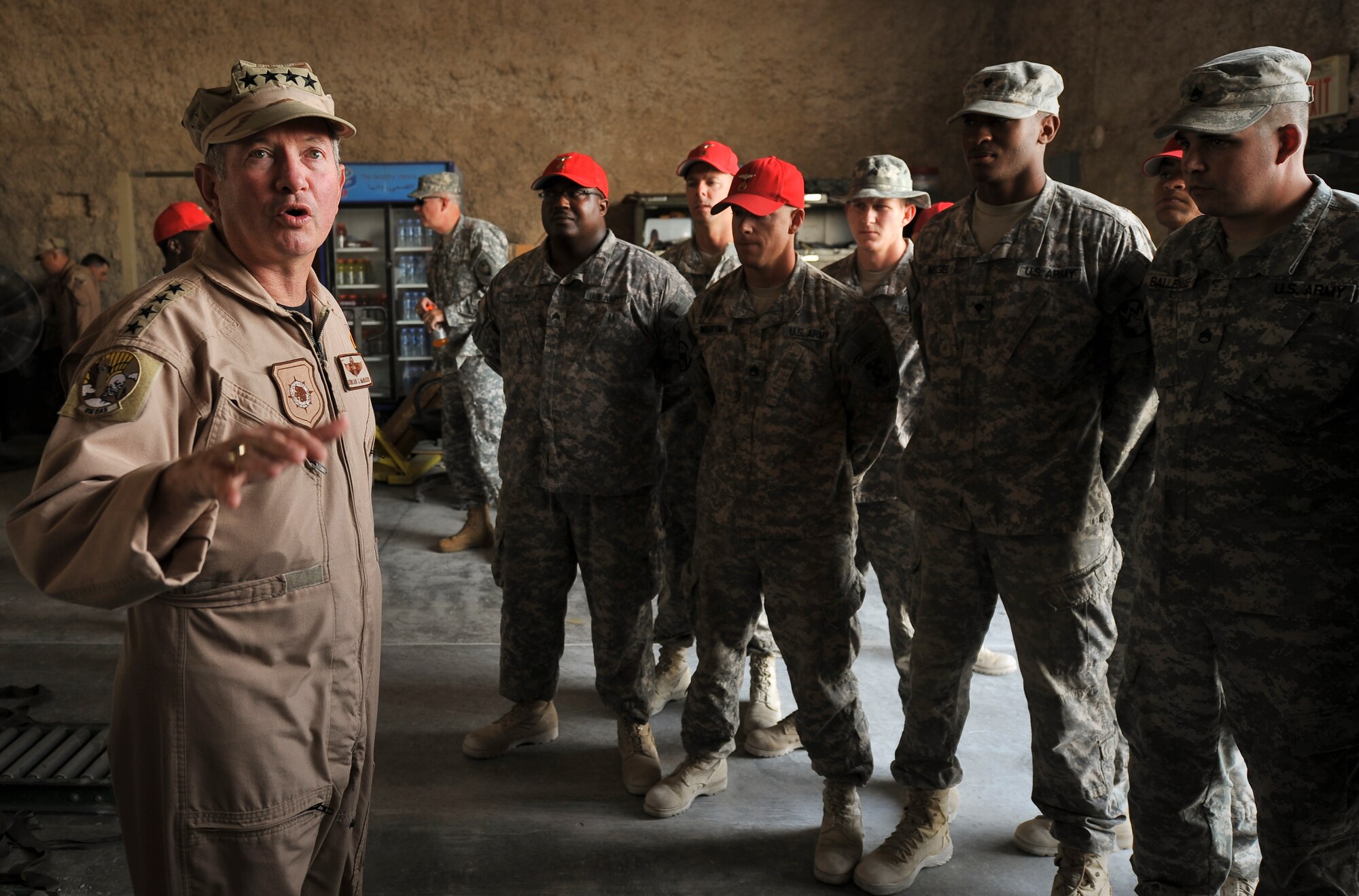 Gen. Duncan J. McNabb, commander, U.S. Transportation Command, speaks to Soldiers of the 824th Quartermaster Company Detachment 10, Oct. 4, 2011, at an undisclosed location in Southwest Asia. McNabb’s visit was just one stop on a tour of bases throughout the U.S. Central Command Area of Responsibility to thank servicemembers for their sacrifice and dedication. USTRANSCOM is the single manager for global air, land and sea transportation for the Department of Defense. The quartermaster’s riggers provide vital supplies to servicemembers throughout the CENTCOM AOR by preparing supply pallets for air-drop delivery by C-17 Globemaster III aircraft. The general is scheduled to retire Nov. 30, 2011, after more than three decades of service. (U.S. Air Force photo/Senior Airman Paul Labbe)