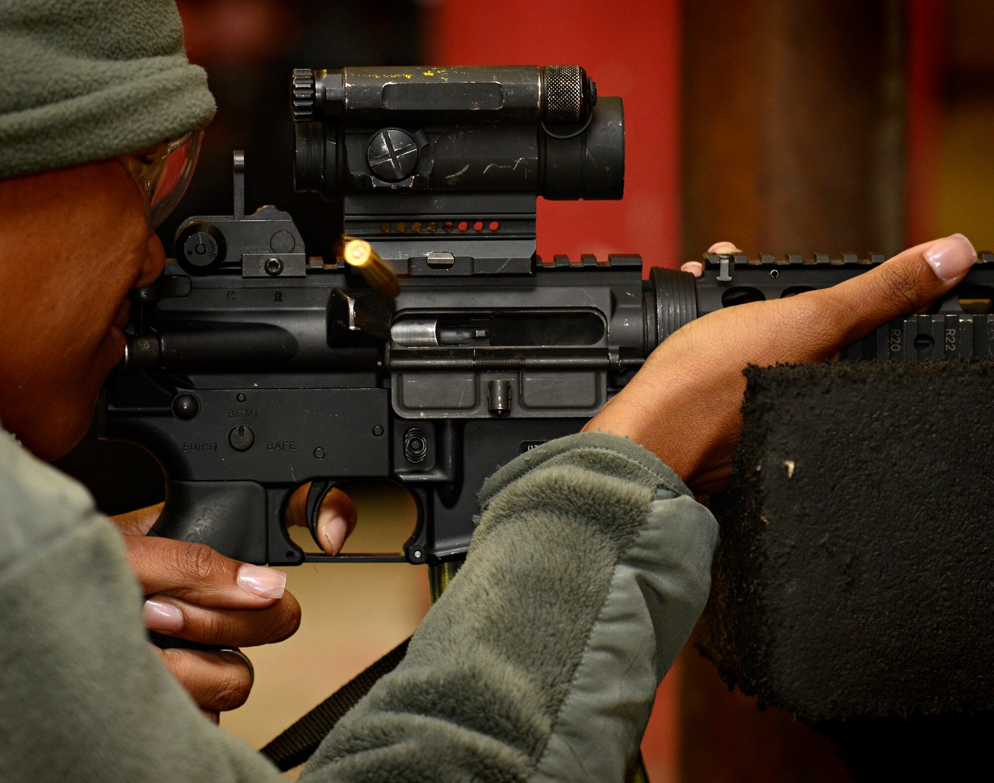 VOGELWEH, Germany – Senior Airman Monique Young, 569th U.S. Force Protection Squadron, fires an M-4 Carbine while taking the new Air Force rifle qualification course Oct. 7. The new course of fire has a mandatory implementation date of Dec. 1, 2011. (U.S. Air Force photo/Staff Sgt. Benjamin Wilson)