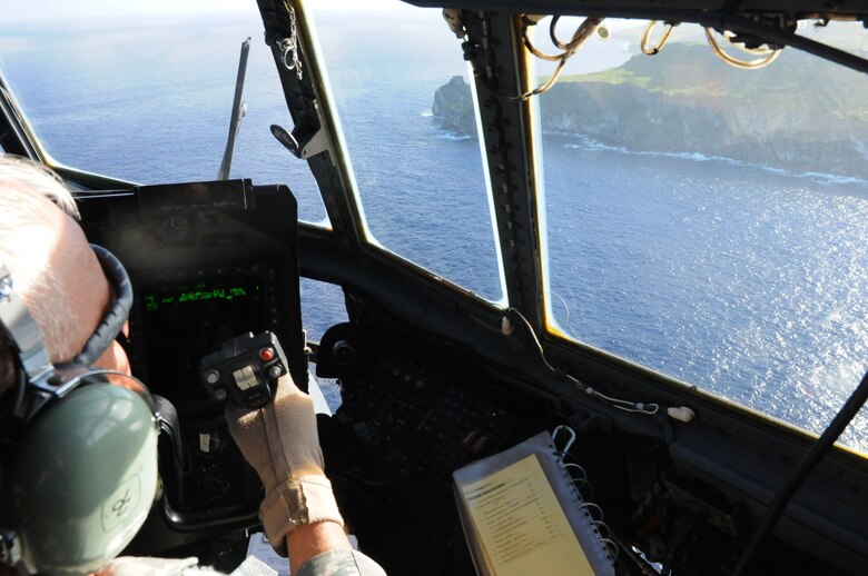 ANDERSEN AIR FORCE BASE, Guam – A view from the cockpit of a MC-130 aircraft flying over Tinian Island. The aircraft transported senior leaders of team Andersen to Tinian Island to take part in a historic island tour Oct. 11. (U.S. Air Force photo/ Senior Airman Carlin Leslie)