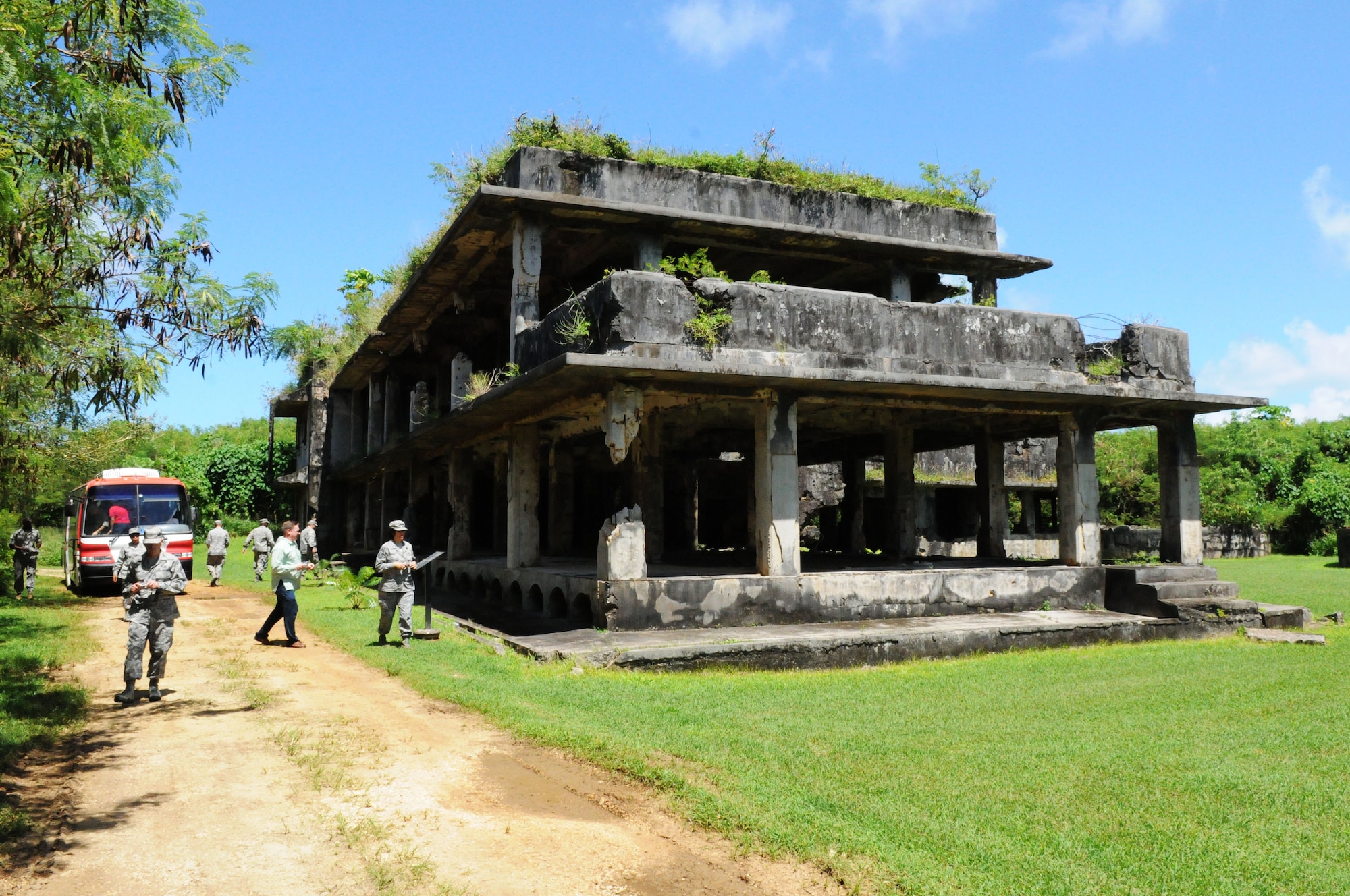 ANDERSEN AIR FORCE BASE, Guam – Senior leaders of Team Andersen visit the Japanese Command Post from World War II on Tinian Island, Oct.11 during a staff visit and tour. The structures on Tinian have since deteriorated but the foundations and outlines can still be seen through the vast jungle. (U.S. Air Force photo/ Senior Airman Carlin Leslie)