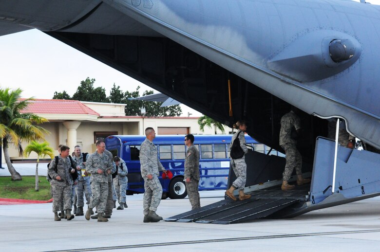 ANDERSEN AIR FORCE BASE, Guam – Senior  leadership from Team Andersen climb aboard a MC-130, for a staff ride to Tinian Island, Oct. 11. During the visit , they toured American and Japanese facilities from World War  II and were given a rich historical brief on engagements on the island. (U.S. Air Force photo/ Senior Airman Carlin Leslie)