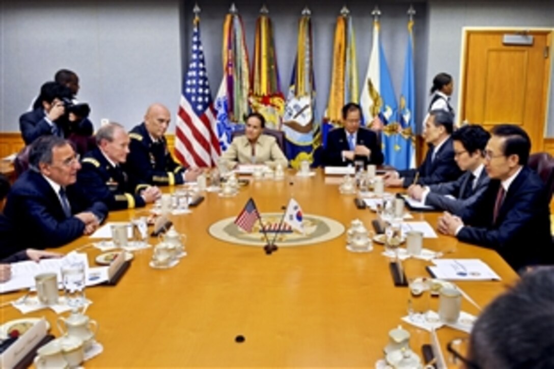 U.S. Defense Leon E. Panetta, left center, hosts a meeting with South Korean President Lee Myung-bak, right, and some of his senior advisors at the Pentagon, Oct. 12, 2011. U.S. Army Gen. Martin E. Dempsey, chairman of the Joint Chiefs of Staff, U.S. Army Chief of Staff Gen. Raymond T. Odierno and Undersecretary of Defense for Policy Michele Flournoy joined Panetta.