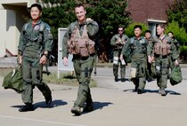 U.S. Air Force pilots from the 35th Fighter Squadron and Republic of Korea Air Force pilots from the 111th Fighter Squadron prepare for a mission at Kunsan Air Base, Republic of Korea Sept. 22, 2011. (Courtesy photo)