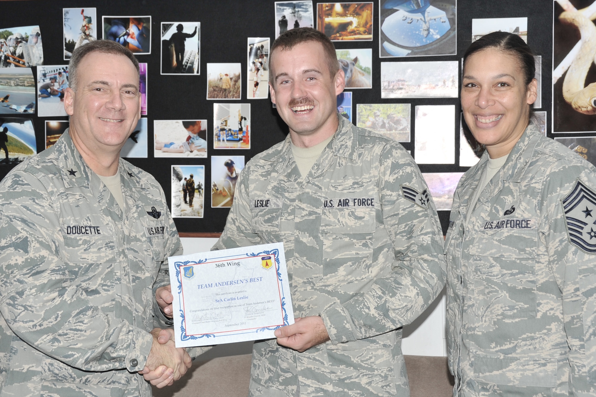 Senior Airman Carlin Leslie, 36th Wing Public Affairs photographer was awarded Team Andersen's Best here, Sept. 28. Andersen's Best is a recognition program which highlights a top performer from the 36th Wing. Each week, supervisors nominate a member of their team for outstanding performance and the wing commander presents the selected Airman/Civilian with an award. (U.S. Air Force photo illustration by Staff Sgt. Alexandre Montes)