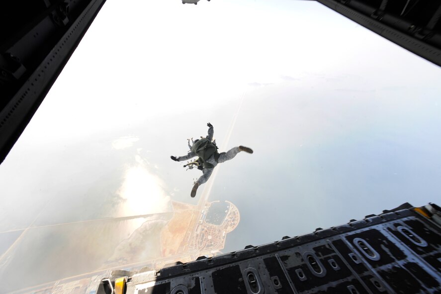 Army members from the Special Operations Command Korea's 39th Special Forces Detachment along with Air Force survival, evasion, resistance and escape specialists jump out of a C-130H Hercules from Yokota Air Base, Japan, at the Gunsan-Saemangeum Airshow in Gunsan City, Republic of Korea, Oct. 9, 2011. The U.S. Air Force and SOCKOR performed the jump together at 10,000 feet from a C-130, highlighting military free-fall operations. The City of Gunsan, the 8th Fighter Wing and the Republic of Korea Air Force’s 38th Fighter Group hosted the air show. (U.S. Air Force photo by Staff Sgt. Rasheen A. Douglas/Released)