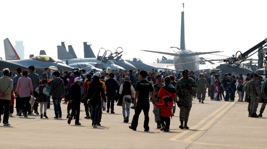 Koreans from across the peninsula familiarized themselves with U.S Air Force, U.S. Army and Republic of Korea Air Force aircraft and equipment during the 2011 Gunsan-Saemangeum Air Show at Kunsan Air Base, Republic of Korea, Oct. 8, 2011. The air show featured many static displays and performances from across the Pacific Air Forces and Korean peninsula. (U.S. Air Force photo by Senior Airman Benjamin Stratton/Released)