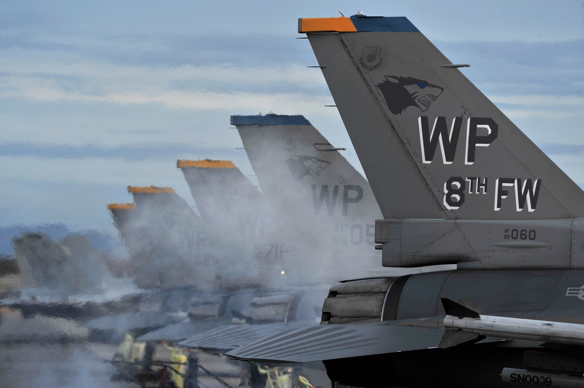 U.S. Air Force F-16 Fighting Falcons from Kunsan Air Base, Republic of Korea, prepare for the first flight of exercise RED FLAG-Alaska 12-1 Oct. 7, 2011, Eielson Air Force Base, Alaska. RF-A is conducted in the Joint Alaska Range Complex, a 67,000 square mile training range, which provides participants eight to 10 simulated combat sorties. (U.S. Air Force photo by Staff Sgt. Christopher Boitz/Released)