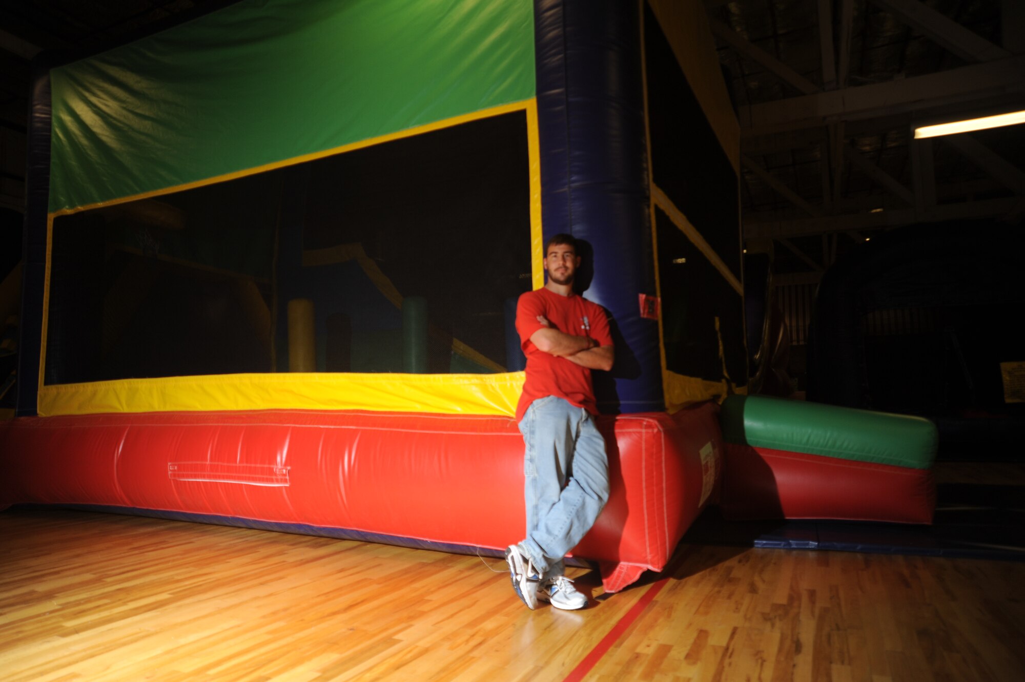 Joshua Marro pictured at the Funspot where he maintains the bouncy castles, play areas and moniters children in order to provide a clean and safe enviornment for them to play in. (U.S. Air Force photo/Airman 1st Class Earlandez M. Young) 