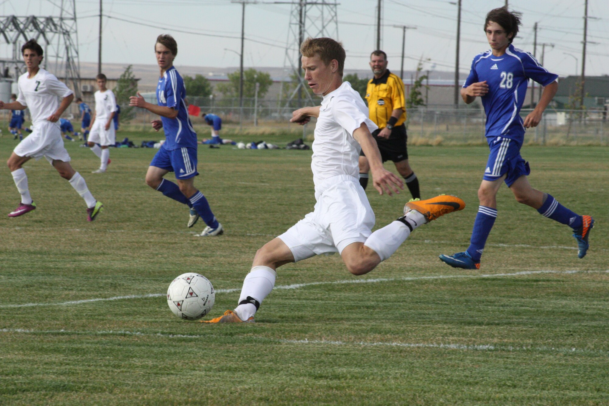 C.M. Russell High School junior Nick Downs goes for the ball during a cross-town match against Great Falls High School in September. (Courtesy photo)