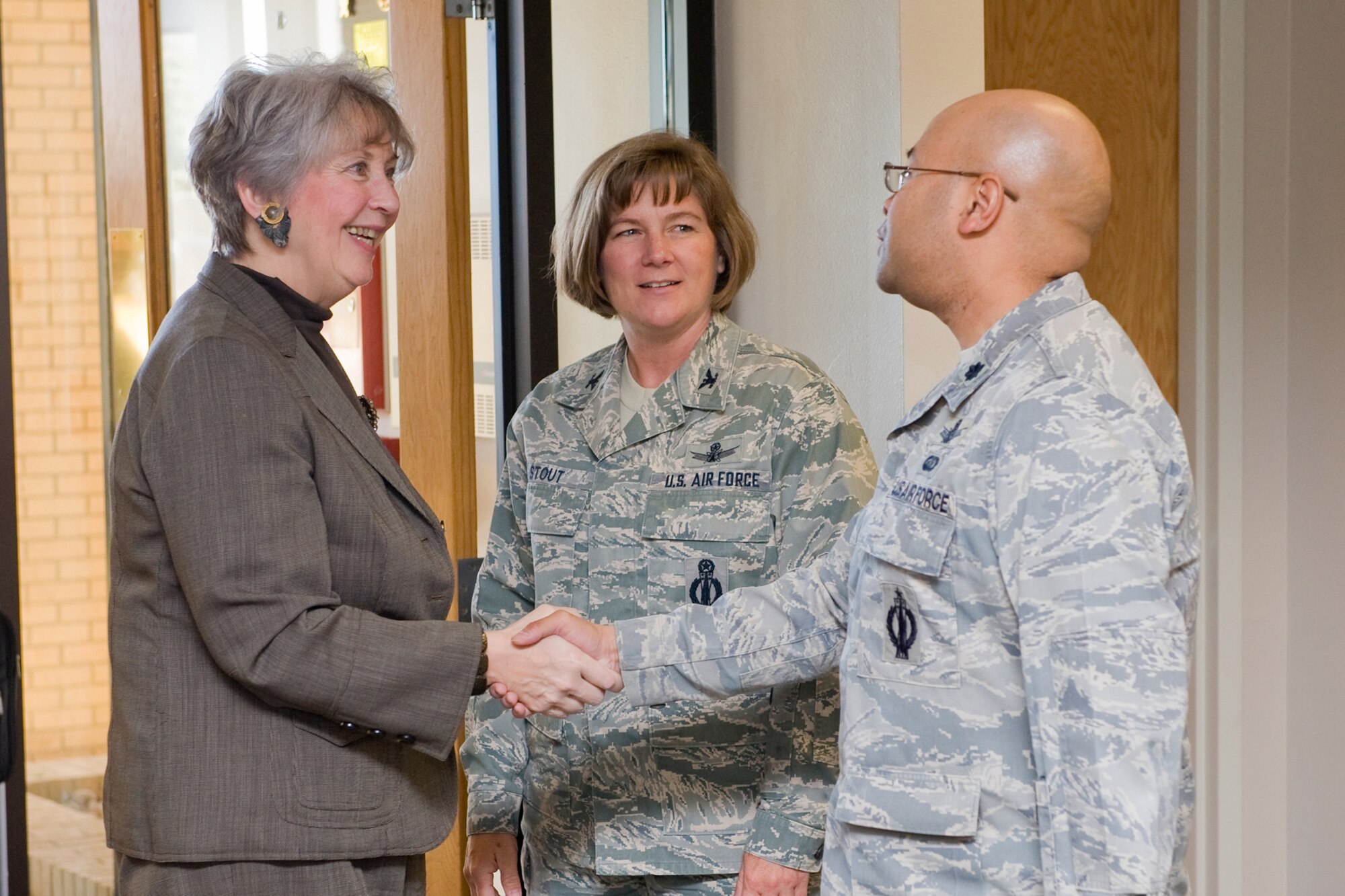 Lt. Col. Billy Wade, acting 341st Mission Support Group deputy commander, introduces himself to Mitchell prior to the start of a working luncheon with MSG leadership Sept. 29. Col. Angela Stout, 341st MSG commander, looks on. (U.S. Air Force photo/Beau Wade)