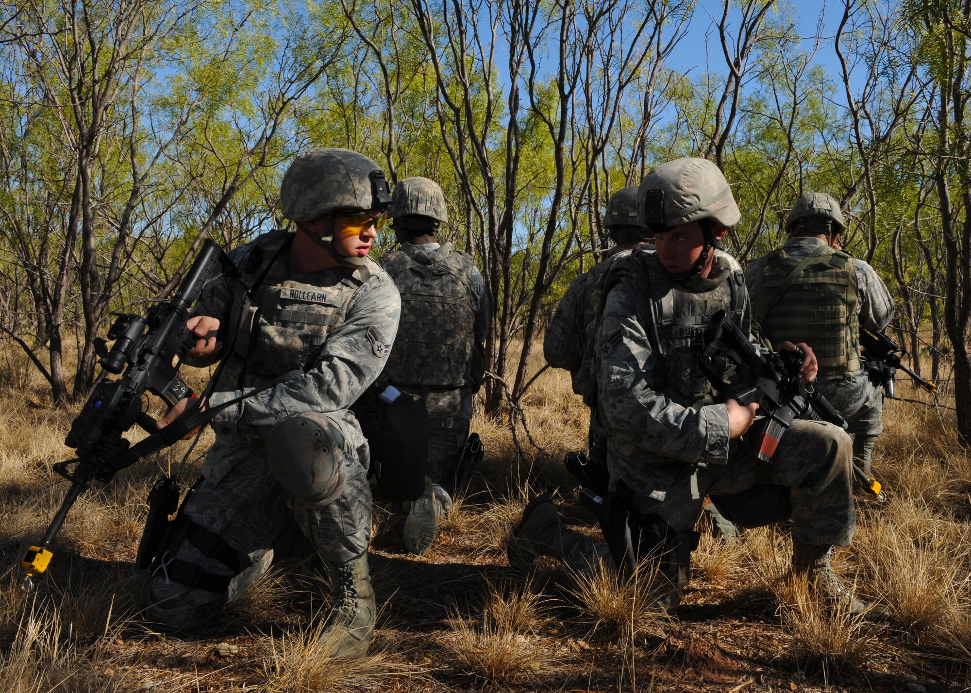 Airman 1st Class Sean Hollearn and Senior Airman Matthew Burnett from the 7th Security Forces Squadron talks out a strategy during training at Oct. 13, 2011 at Dyess Air Force Base, Texas for the upcoming Global Strike Challenge. During the competition Dyess security forces will compete in marksmanship on the M-4, M-9, M-240 and M-230 weapons systems, combat tactics and priority resource defense, and the mental and physical challenge event. (U.S. Air Force photo by Airman 1st Class Jonathan Stefanko/ Released)