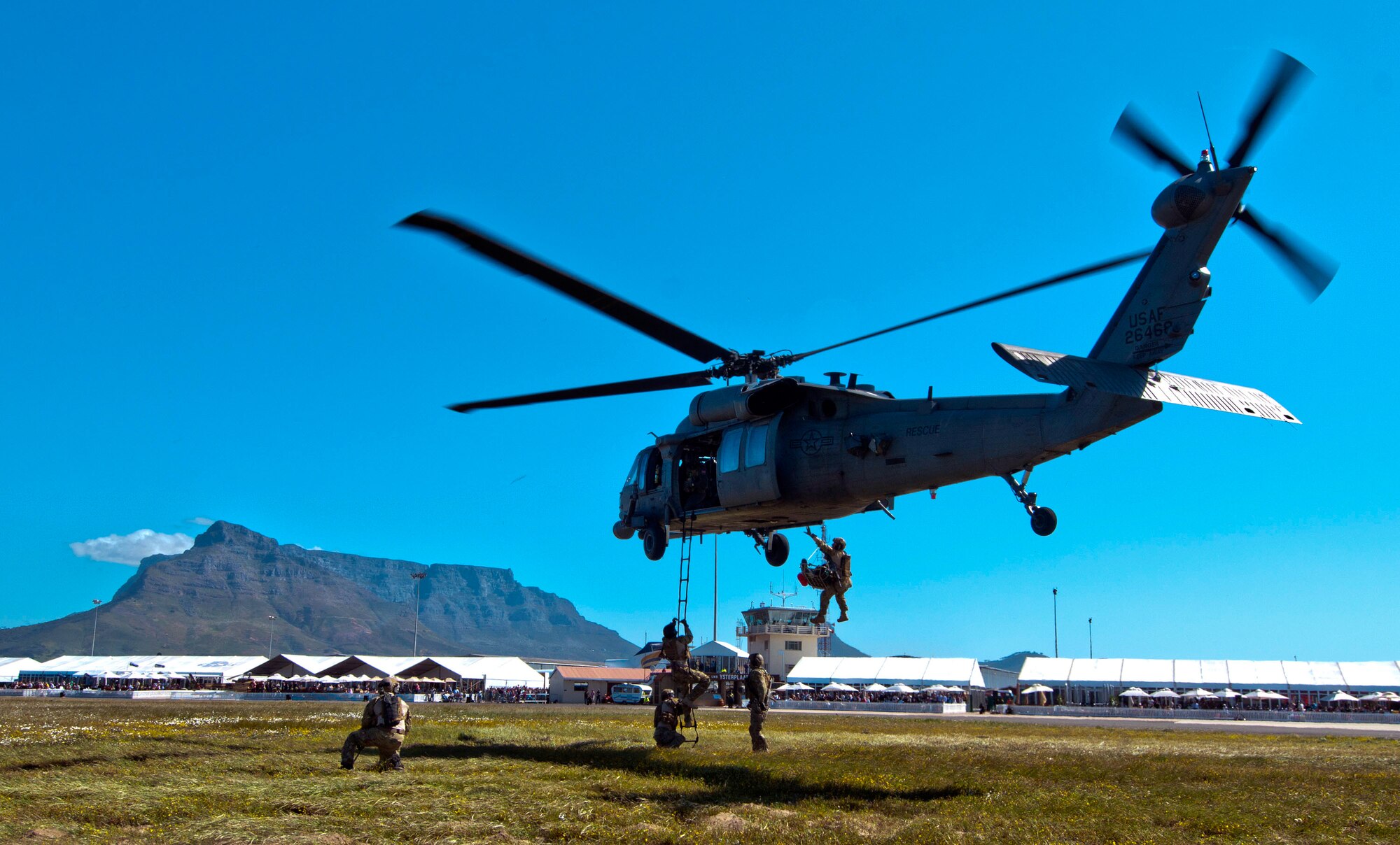 Members of the 106th Rescue Wing demonstrate the capabilities of an HH-60 Pave Hawk helicopter during a previous visit visit to South African in 2010. (New York State Division of Military & Naval Affairs courtesy photo) (Released)