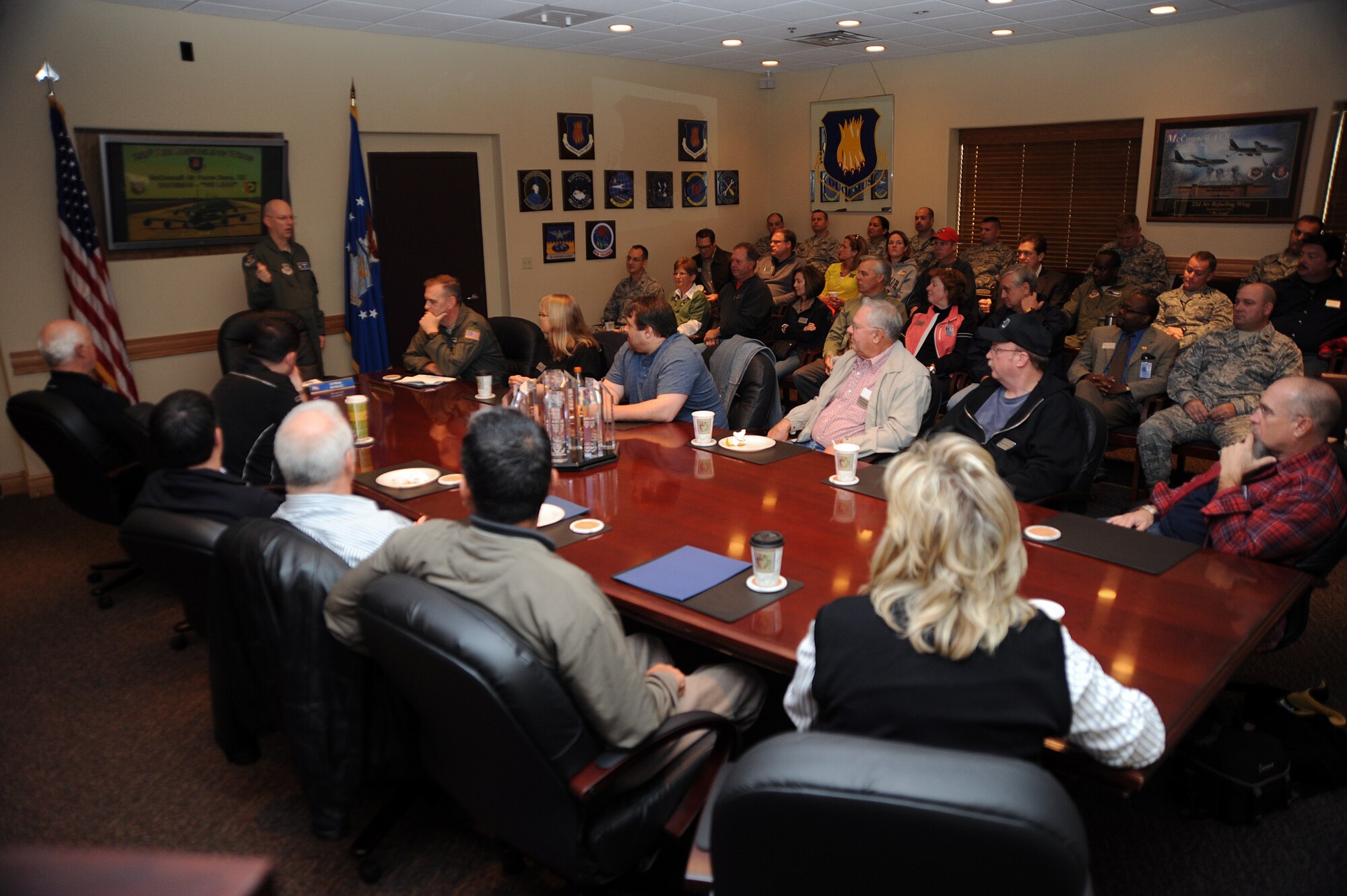 Thiry Kansas civic leaders recently appointed as Honorary Commander participate an interactive forum, discussing McConnell’s mission, history and partnership with the community. The orientation flight is offered annually to civic leaders newly appointed as Honorary Commanders to showcase the base’s mission.  The Honorary Commander program is designed to strengthen the base’s bond with the community.  (U.S. Air Force photo/ Airman 1st Class Jose Leon)