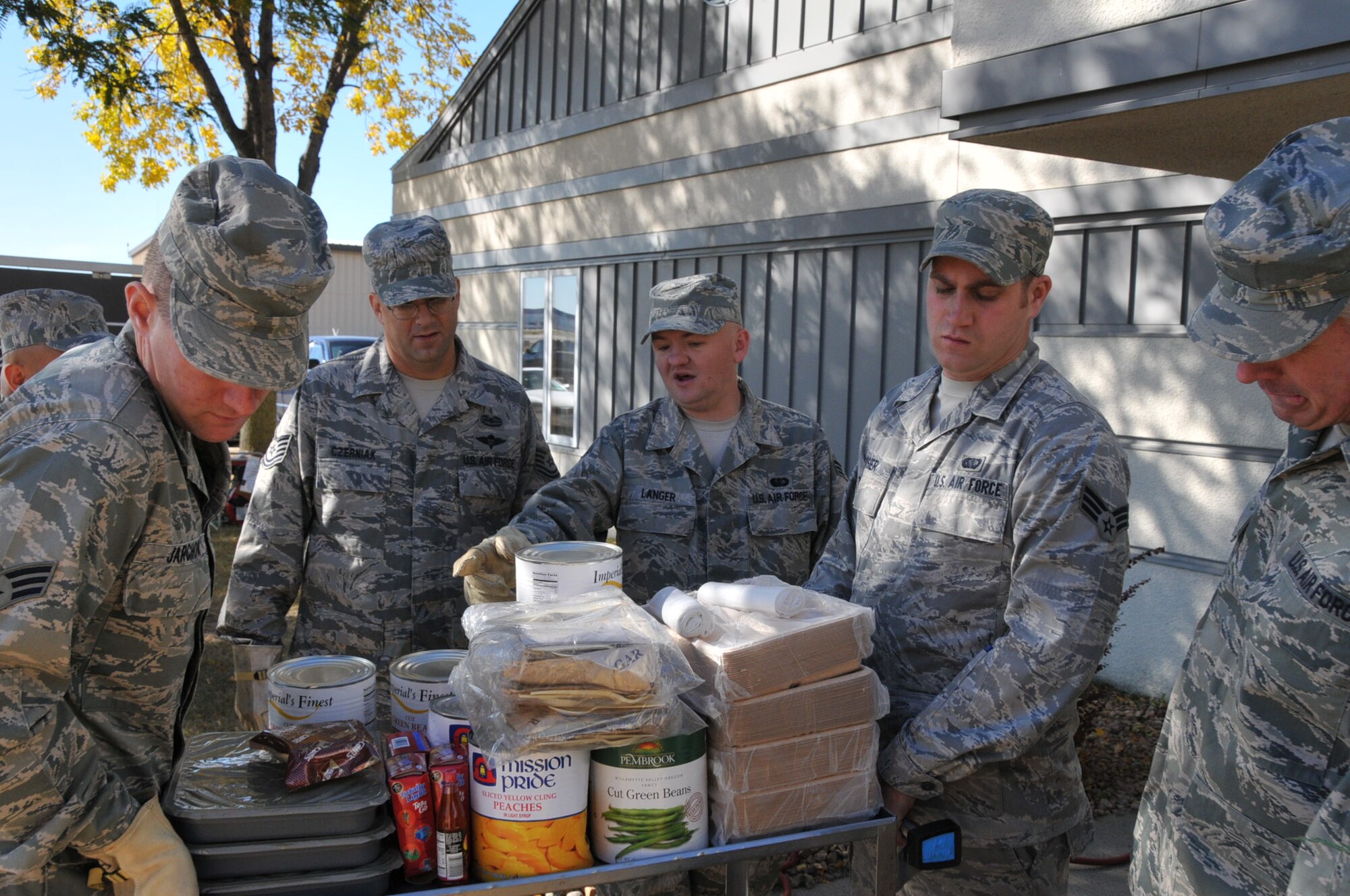 934th Force Support Squadron Airmen set up the Single Pallet Expeditionary Kitchen during an exercise Oct. 1. The SPEK is used to feed Airmen at deployed locations. (Air Force Photo/Tech. Sgt. Jeffrey Williams).
