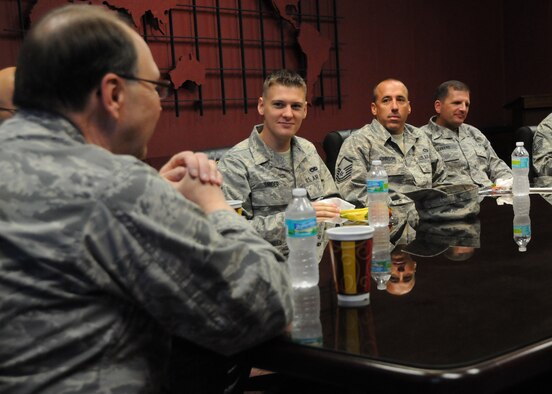 Several 919th Special Operations Wing enlisted reservists listen as Lt. Gen. Charles E. Stenner Jr., chief of the Air Force Reserve and commander of Air Force Reserve Command, responds to their questions during a special breakfast meeting with them Oct. 6 at Duke Field, Fla.  Stenner visited Duke Field during a whirlwind East Coast Tour to more than a dozen of his Reserve units. (U.S. Air Force photo/Tech. Sgt. Cheryl Foster) 