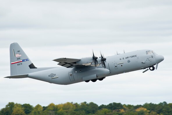 MARIETTA, Ga. - A C-130J Super Hercules piloted by Brig. Gen. Bryan Benson, 18th Air Force Vice Commander, takes off from the Lockheed Martin plant here enroute to Dyess Air Force Base, Texas, Oct. 12. The aircraft became the newest addition to Dyess' 317th Airlift Group, and the 9th of 28 C-130Js to be delivered by 2013 to replace the aging C-130H fleet. 
