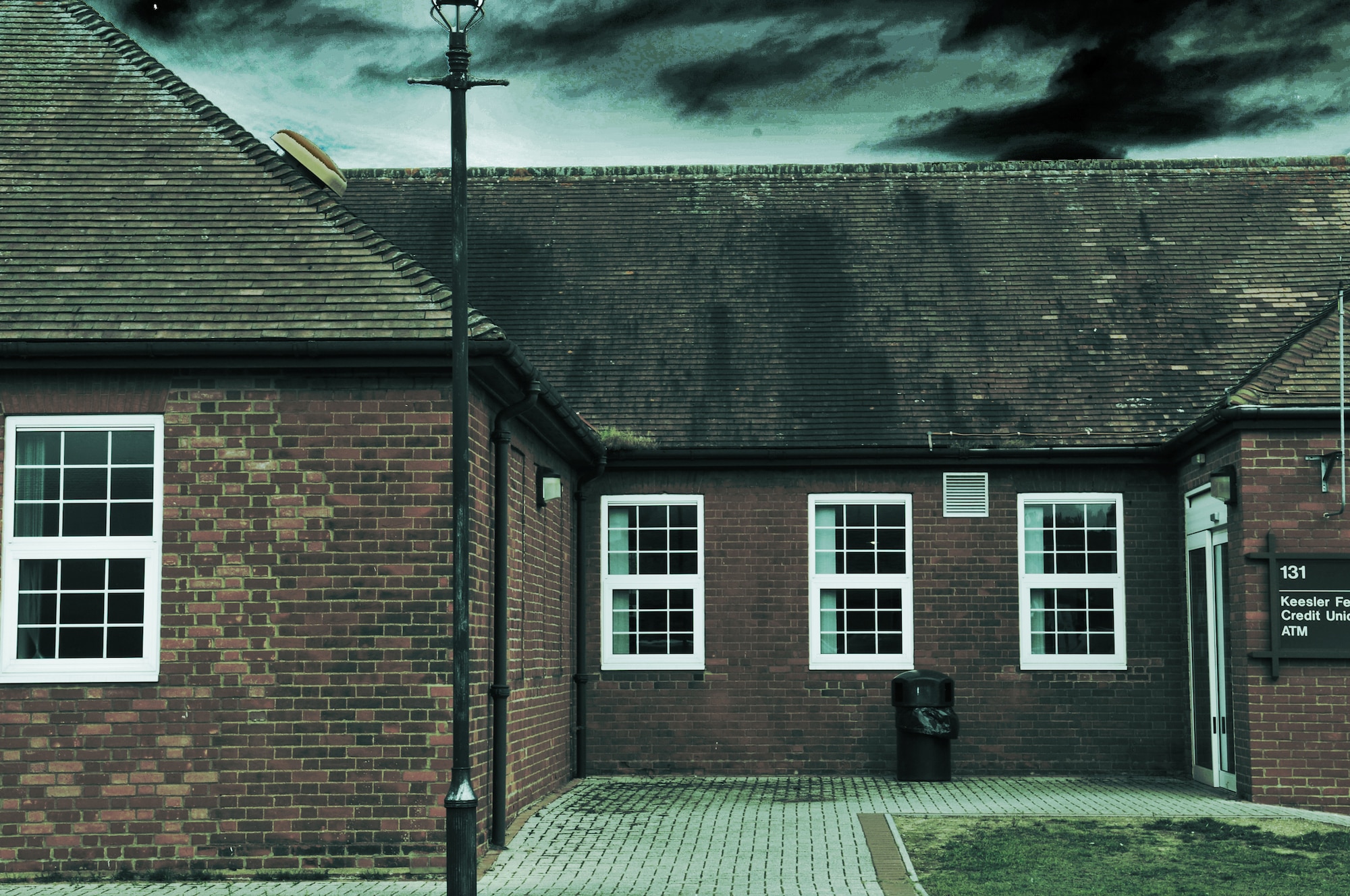 RAF MILDENHALL, England -Building 131, Keesler Federal Credit Union, was once the base commissary and, according to three former employees, was haunted. Eye-witnesses state they saw many supernatural occurrences of a poltergeist nature. (U.S. Air Force photo illustration/Tech. Sgt. Kevin Wallace)