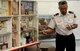 ANDERSEN AIR FORCE BASE, Guam—Ernest Rios, 36th Civil Engineer Squadron fire department assistant chief of fire prevention, uses a doll house to show the children of the Andersen Elementary School  how fires can start in a home Mr. Rios visited the schools here Oct. 13 during Fire Prevention Week.  (U.S. Air Force photo by Senior Airman Benjamin Wiseman/Released)