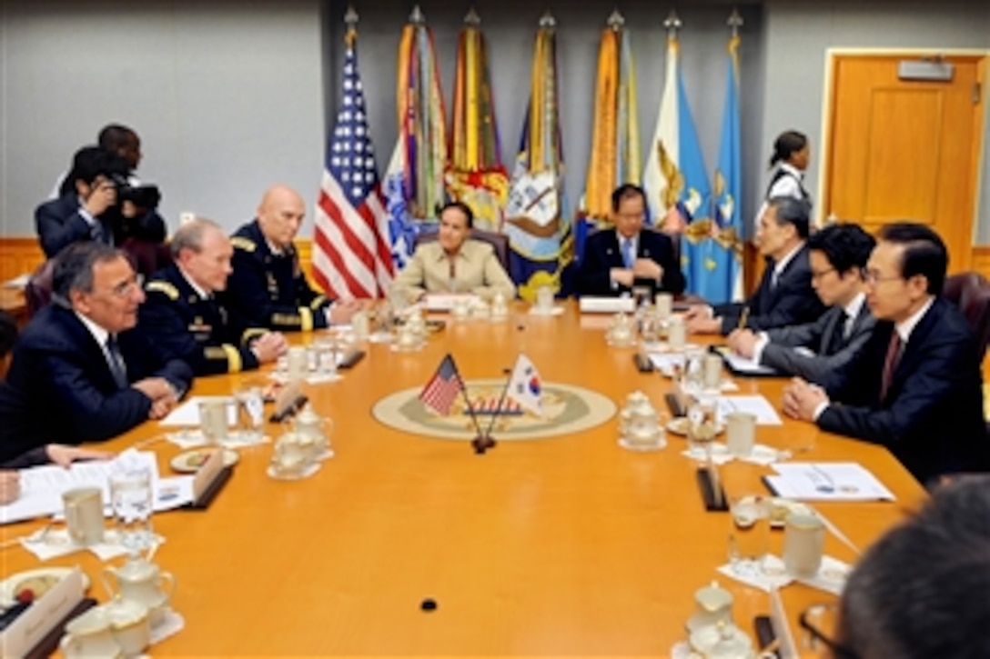 Secretary of Defense Leon Panetta, left, hosts a meeting with South Korean President Lee Myung-bak, right, and some of his senior advisors in the Pentagon in Arlington, Va., on Oct. 12, 2011.  Panetta is joined by Chairman of the Joint Chiefs of Staff Army Gen. Martin Dempsey, Army Chief of Staff Gen. Raymond T. Odierno, and Under Secretary of Defense for Policy Michele Flournoy.  